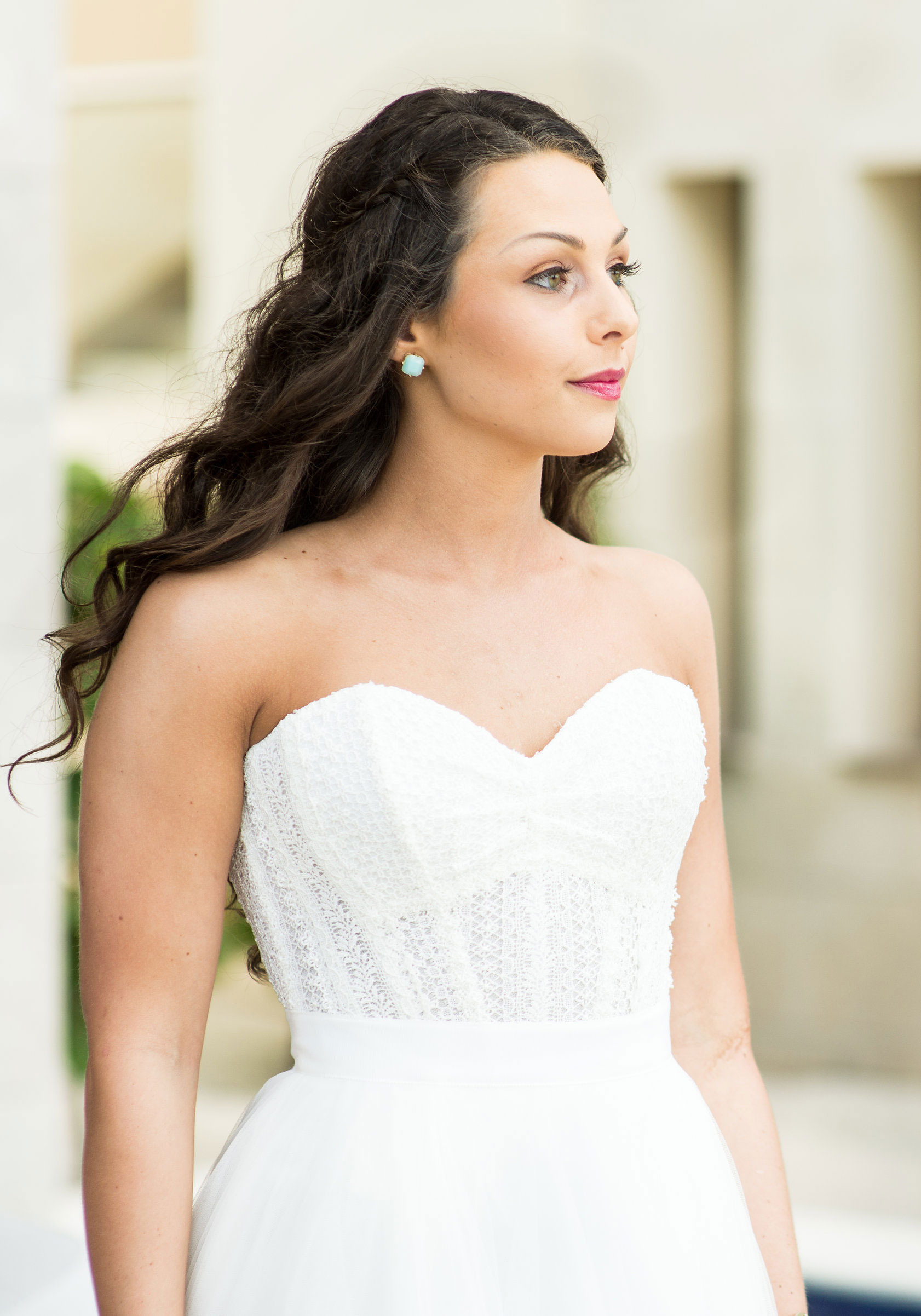 Bride in bridal separates, corset top with Watters Ashan Skirt, Hair Down with small braids.