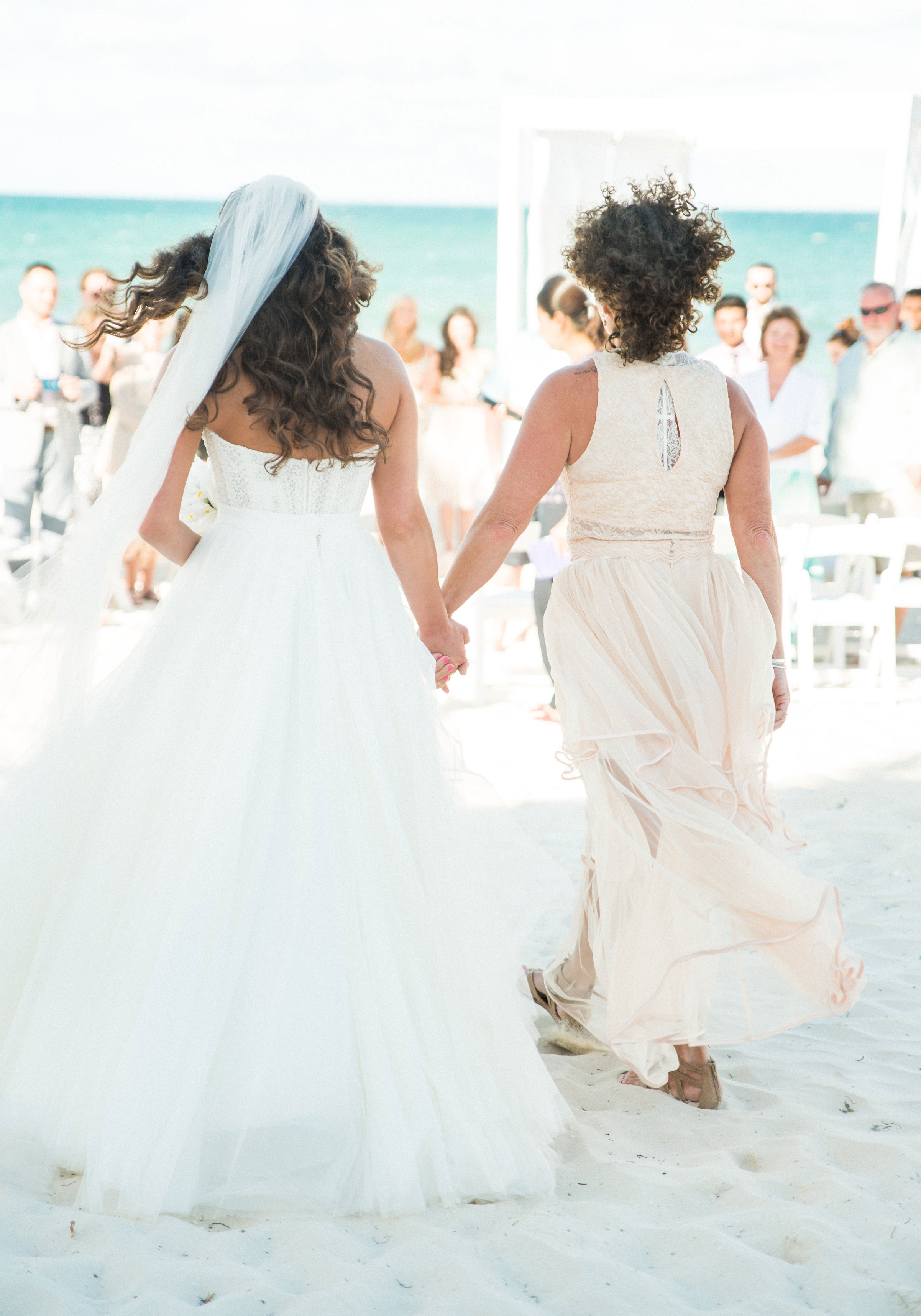 Beach wedding, Mom walking bride down the aisle, Bridal separates, Watters Ashan skirt.