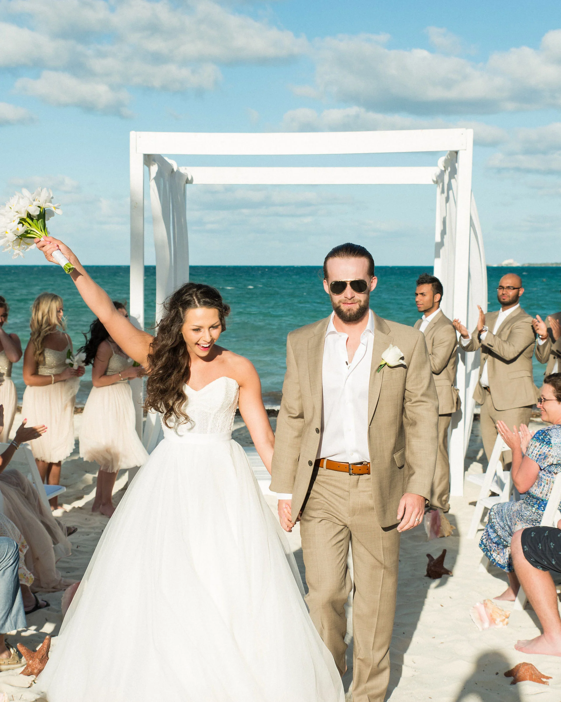 Destination wedding on the beach in Mexico, Bridal separates, Watters Ashan skirt, Simple white bouquet.