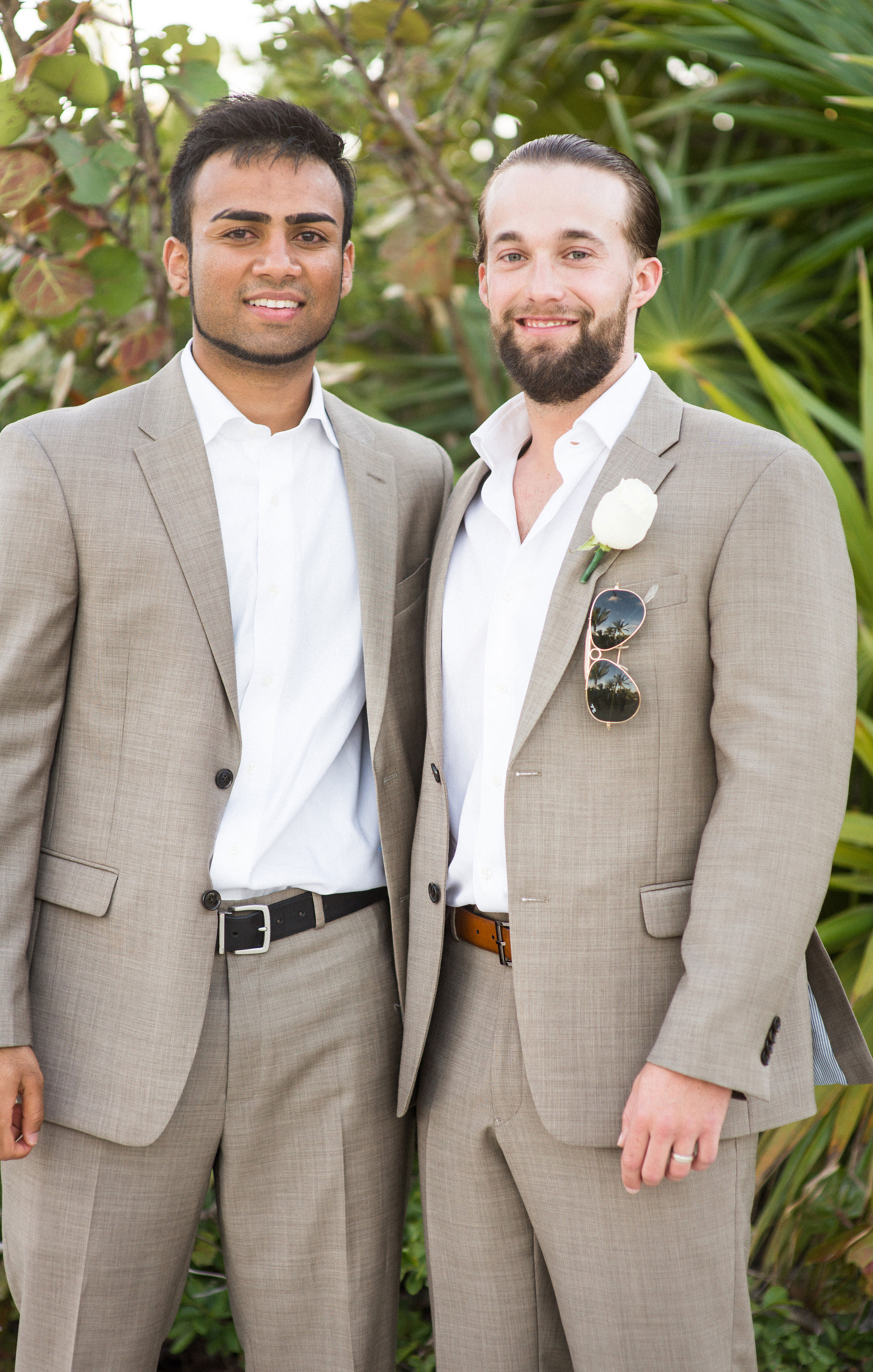 Groom and groomsmen in tan suits for beach wedding.  Destination wedding in Mexico.