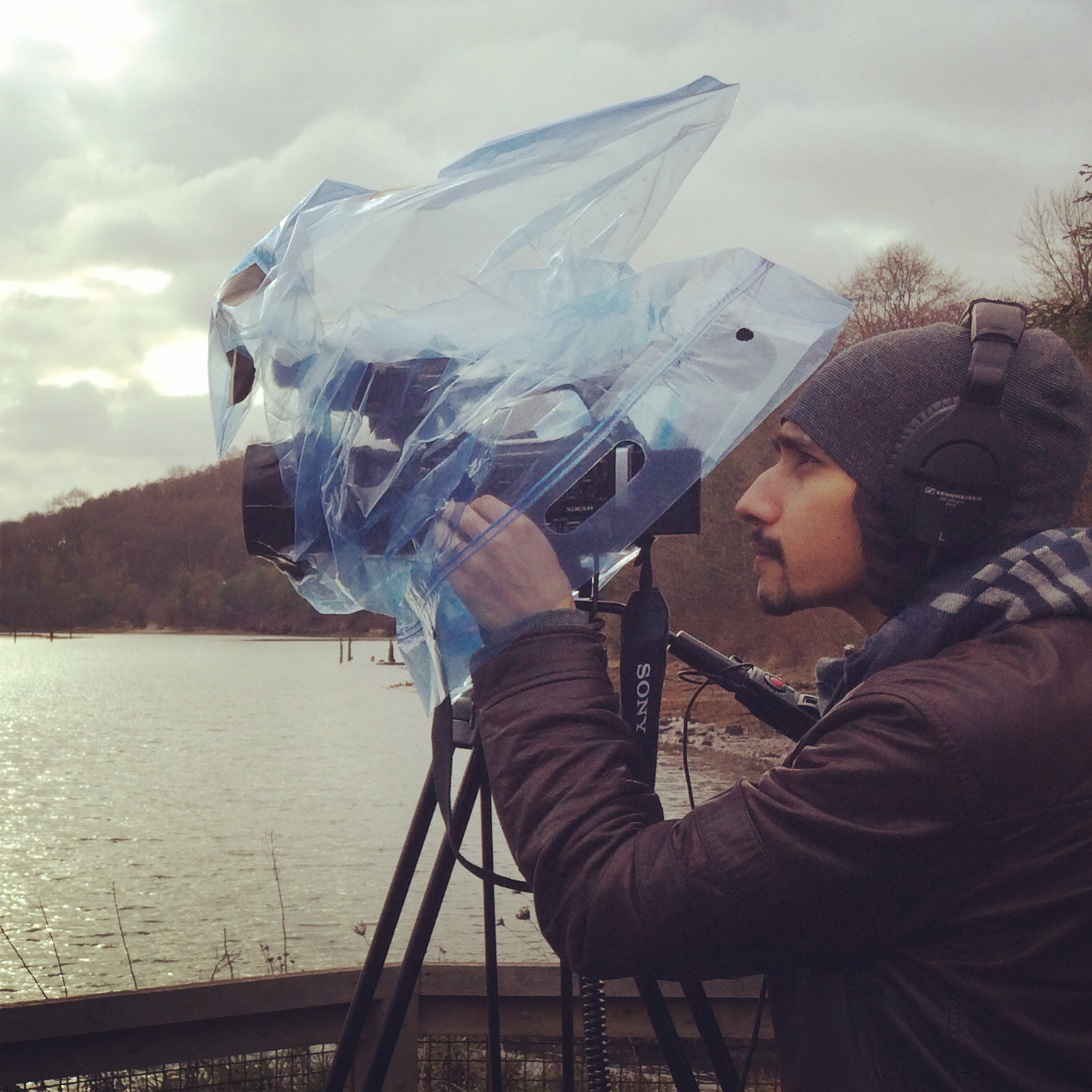 Vasant films the Duwamish River in the rain.