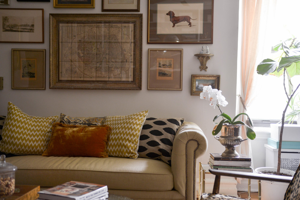 My living room - all of the artwork is vintage or antique | photograph by: Lauren L Caron