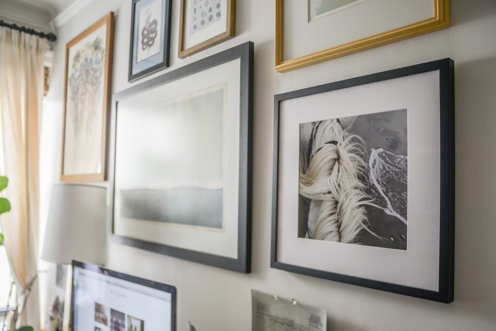 Gallery wall with new print, framed and printed by Framebridge.&nbsp;