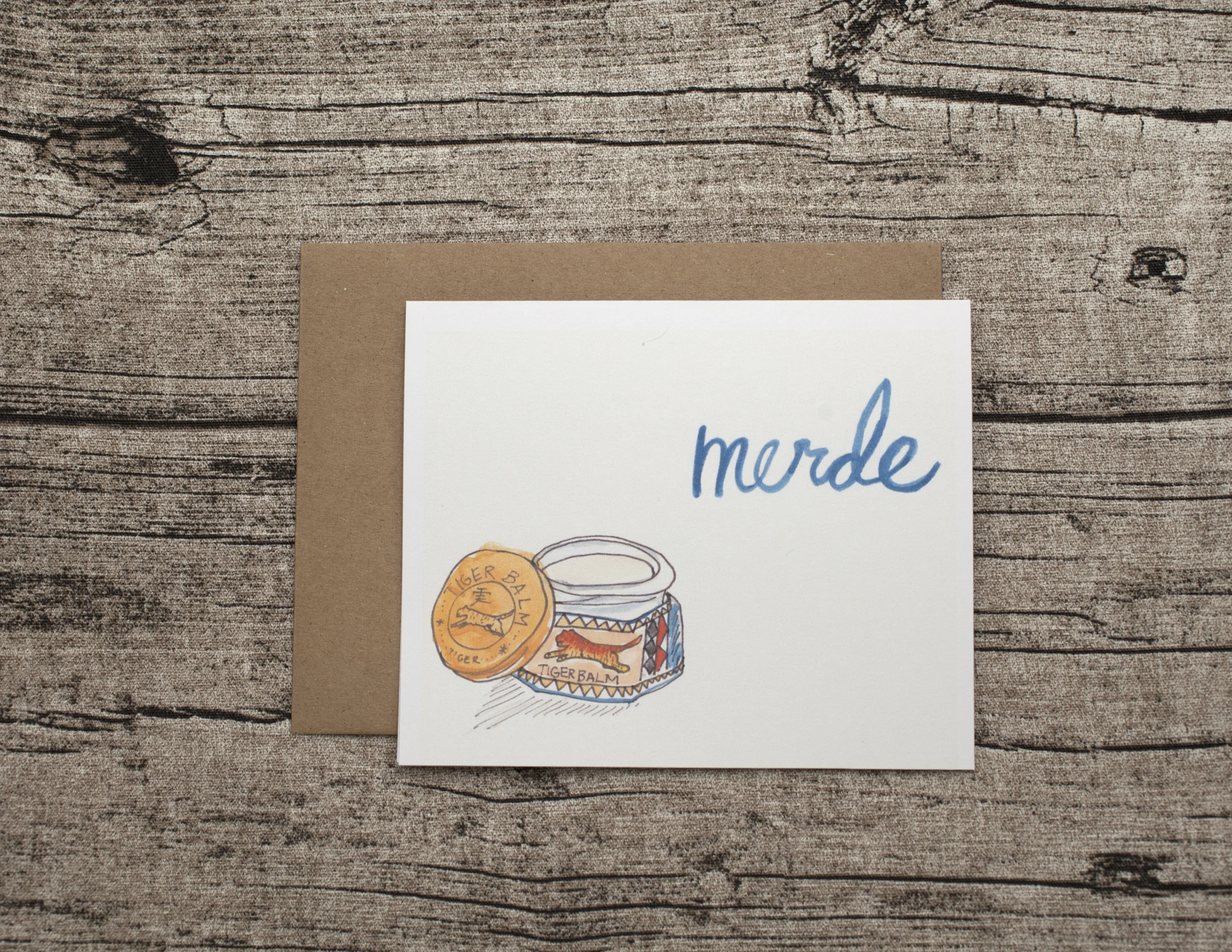 Card_WoodBackground_Merde(1).jpg