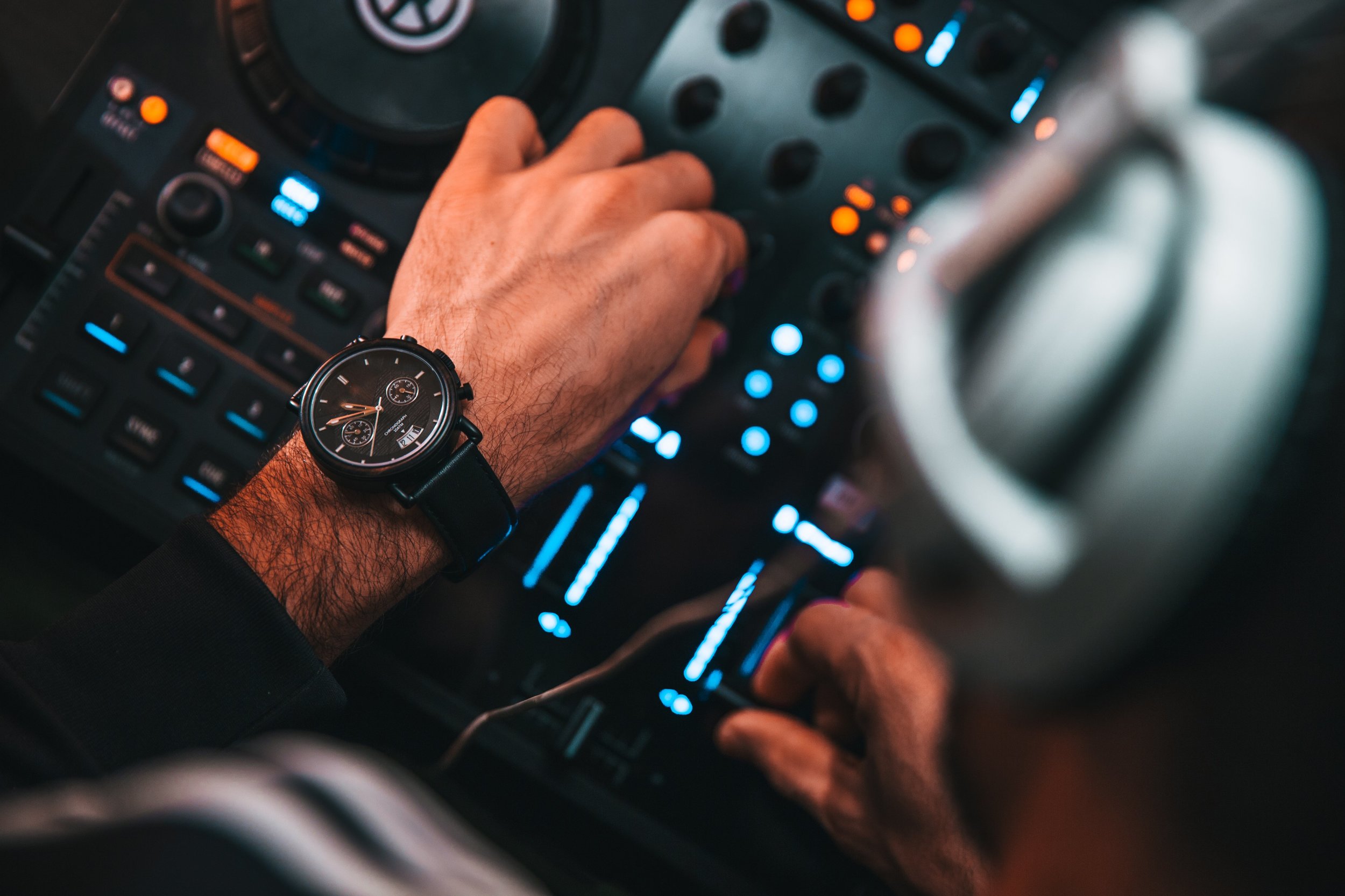 dj-hands-on-mixer.jpg
