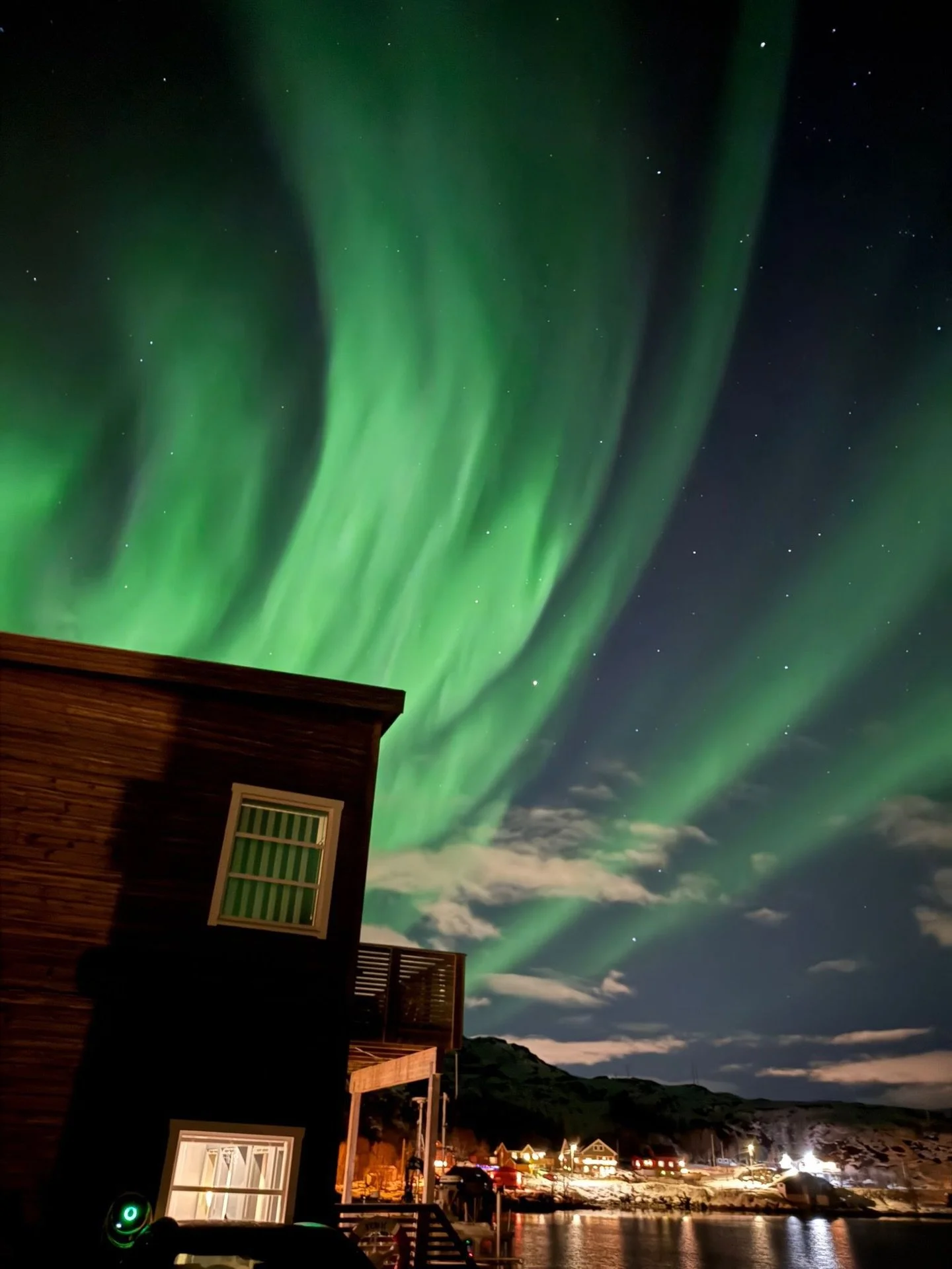 Amazing Northern Lights captured right outside our apartments! 😍 Photo by @orcatravel.co.il @smeital79 #ersfjordbotn #troms&oslash; #northernlightstroms&oslash;