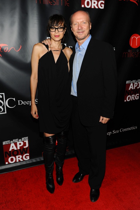 Melissa Jackson and Paul Haggis attends the Artist for Peace and Justice's "Let's build a school for Haiti" fundraising dinner at Salon Millesime at Carlton Hotel
