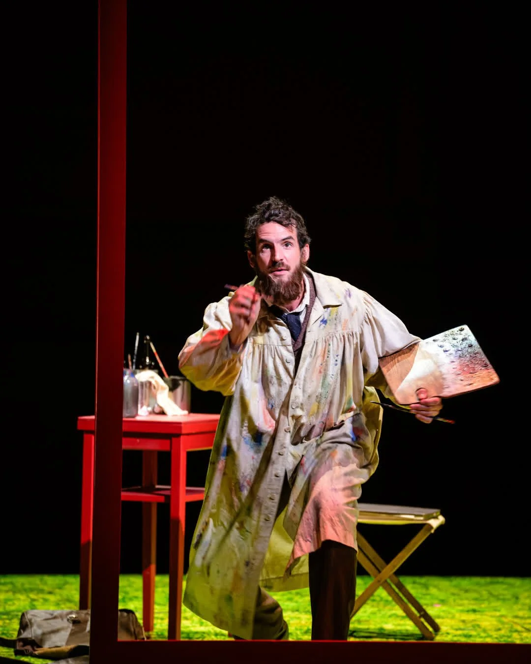 1884 George absorbed in painting.jpg