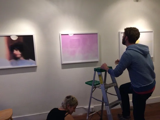 Jori Ketten and Micah Salkind hanging the show