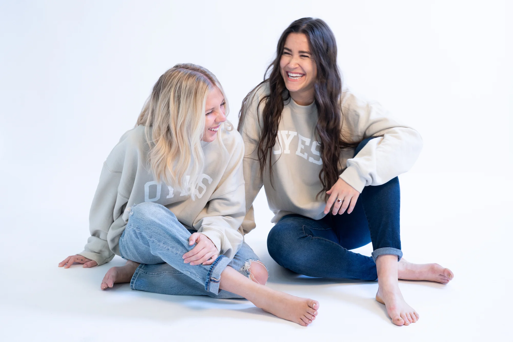 Atlee Feingold (right) with OYES cofounder Savannah Hense.