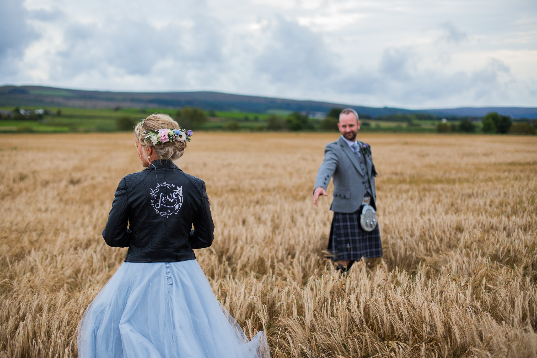 Couple in barley field at Dalduff Farm Wedding
