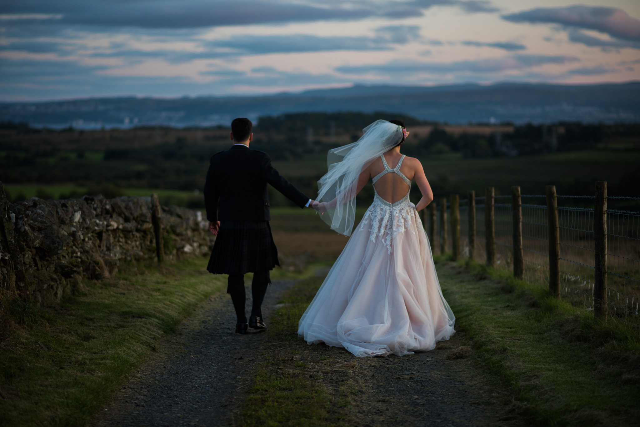 Bride and Groom walking for Loch Lomond Wedding