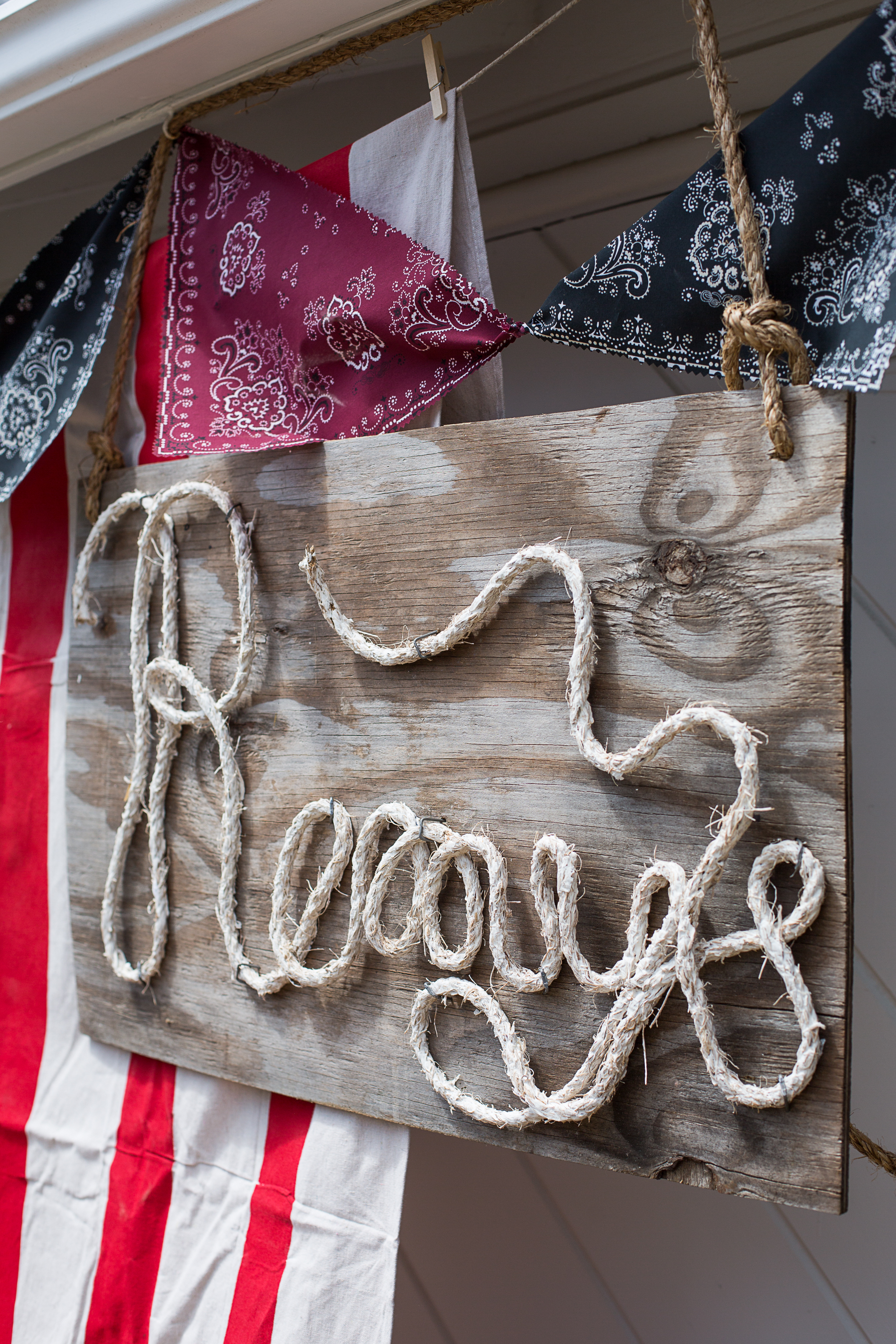  A DIY rope sign (so simple!).&nbsp; Follow the instructions available at Love Grows Wild (http://lovegrowswild.com/2013/08/how-to-make-rope-letters/).&nbsp; I used hemp rope because that is what I had laying around. 