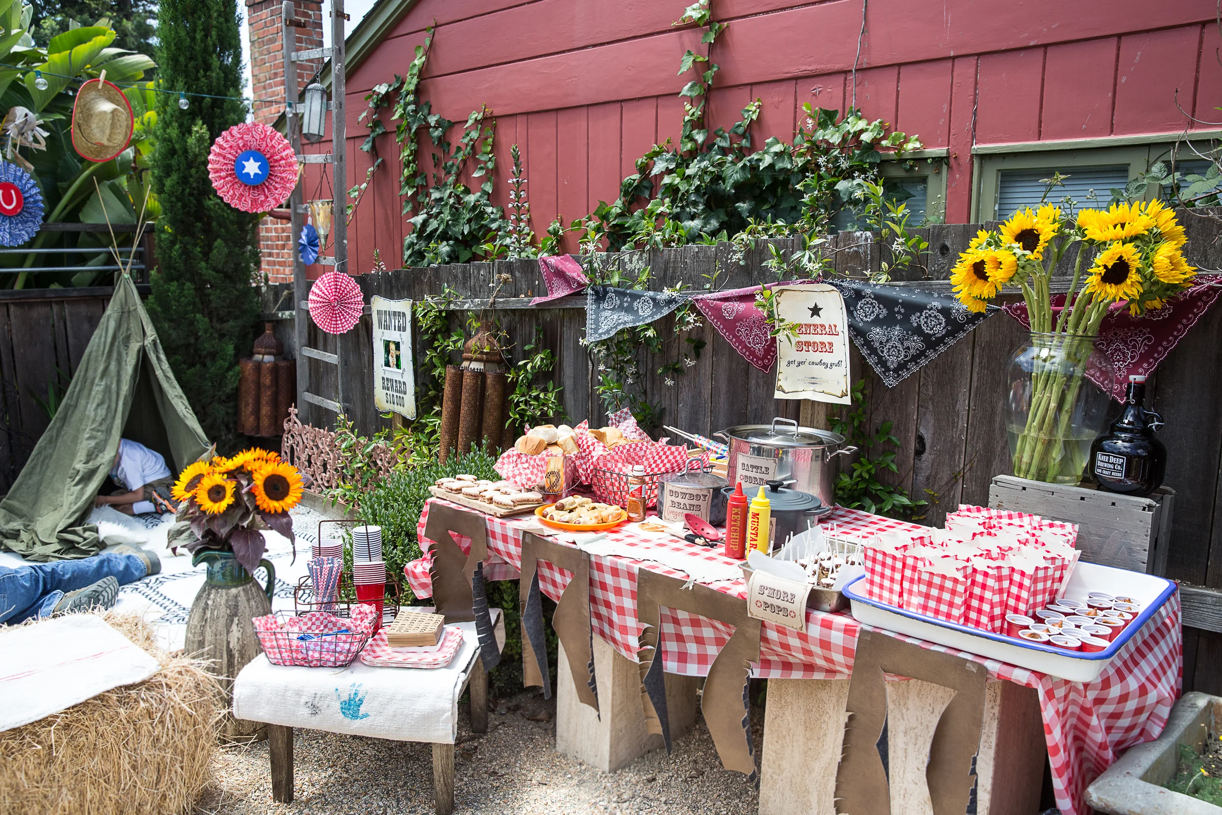 A proper Cowboy spread. (Notice the tent in the corner..we made that from a WWII pup tent that I picked up at an estate sale, add a few bamboo poles, and voila!)