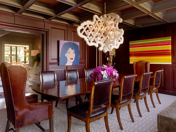 I love the unexpected cow hide on the head chair.