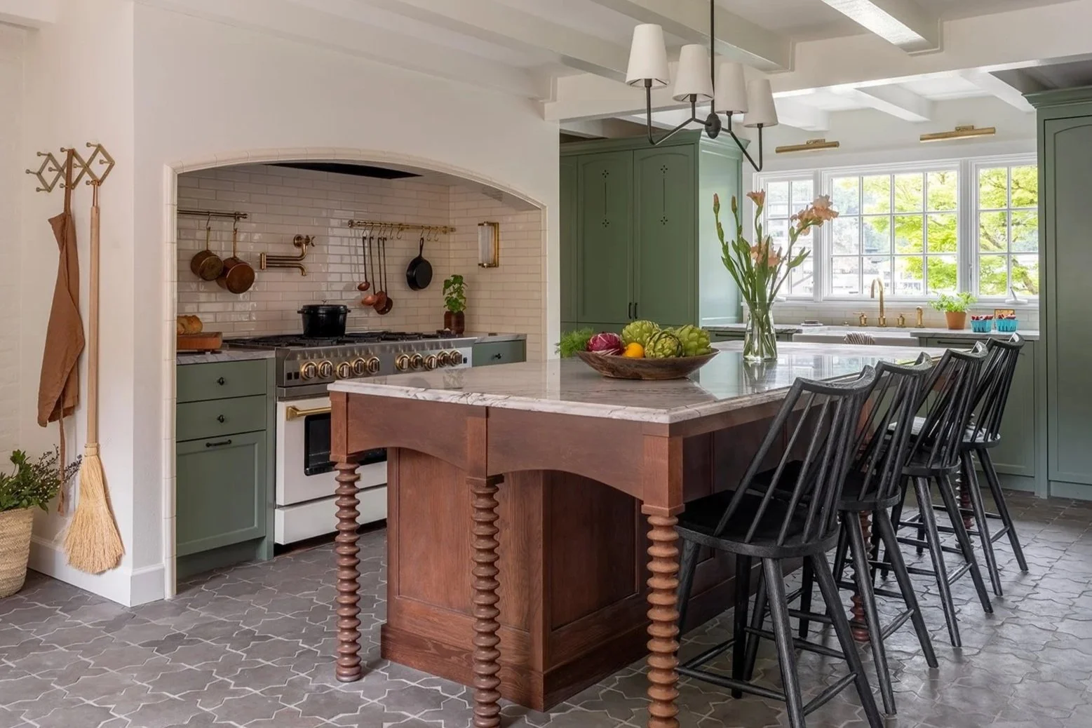 Custom kitchen with stained oak island and turned legs