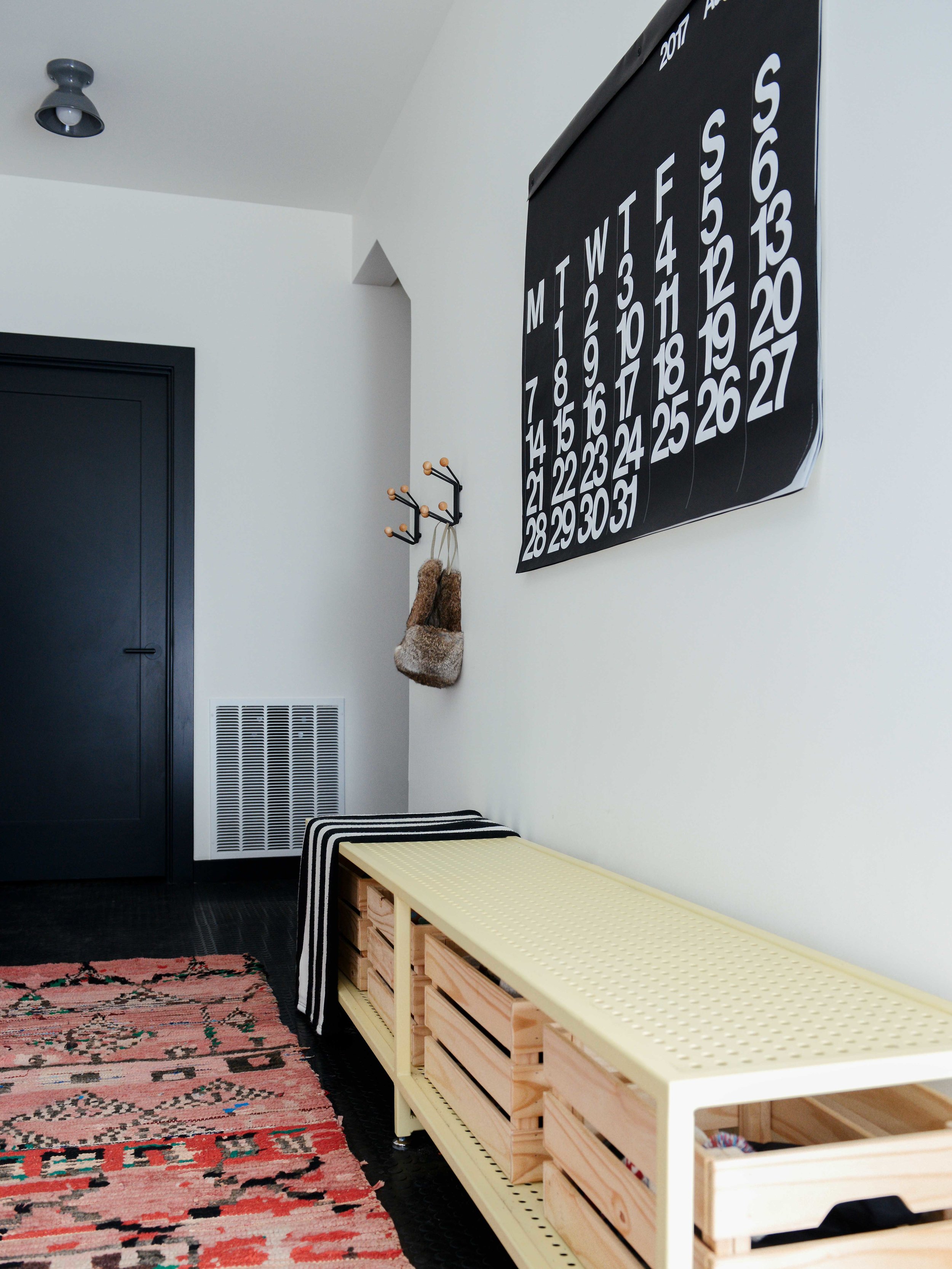 Modern Black & White Mountain Cabin Entry with Moroccan Rug | Casework Interior Design | Portland, OR