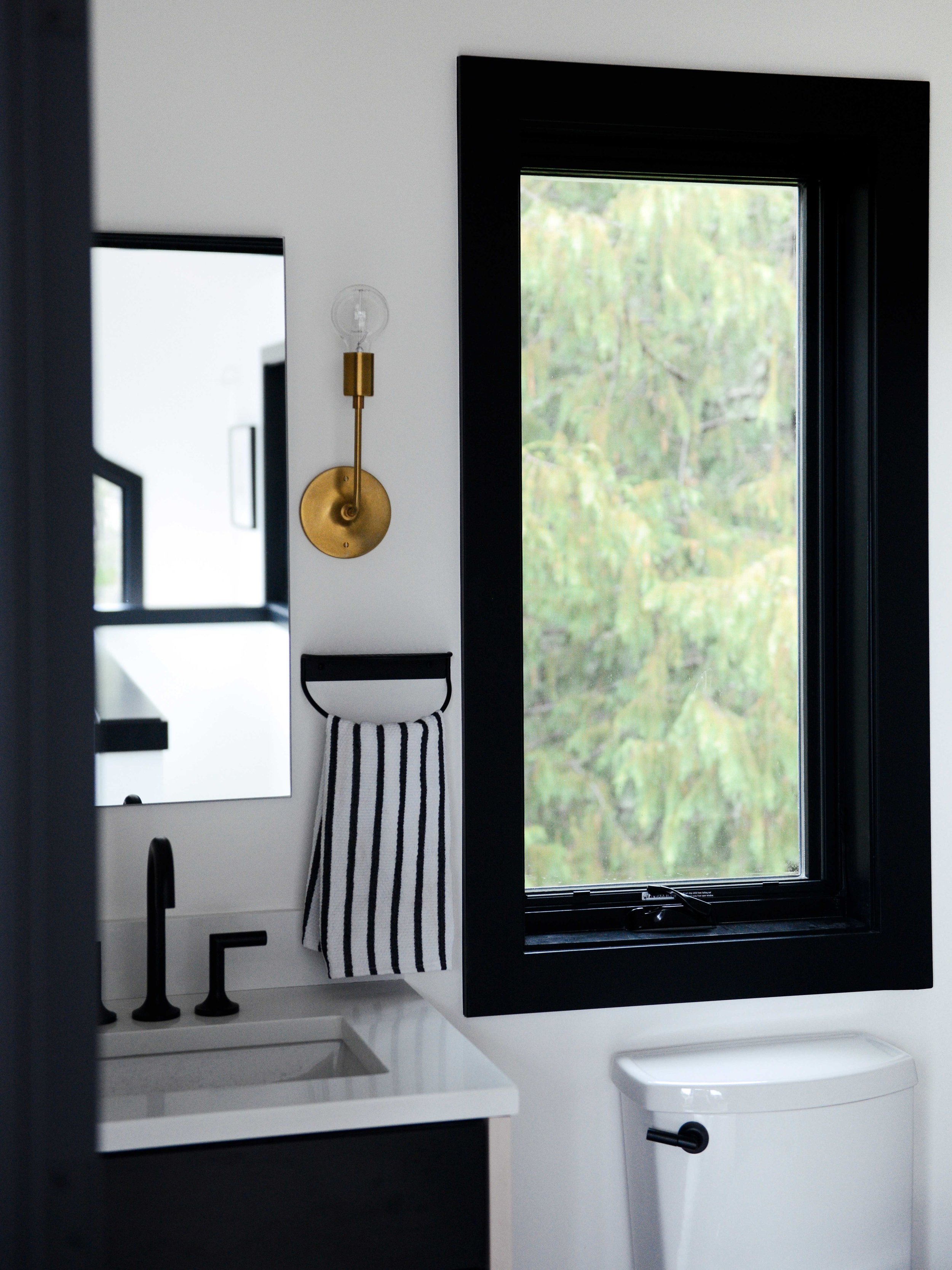 Modern Black & White Mountain Cabin Bathroom with Brass Details | Casework Interior Design | Portland, OR