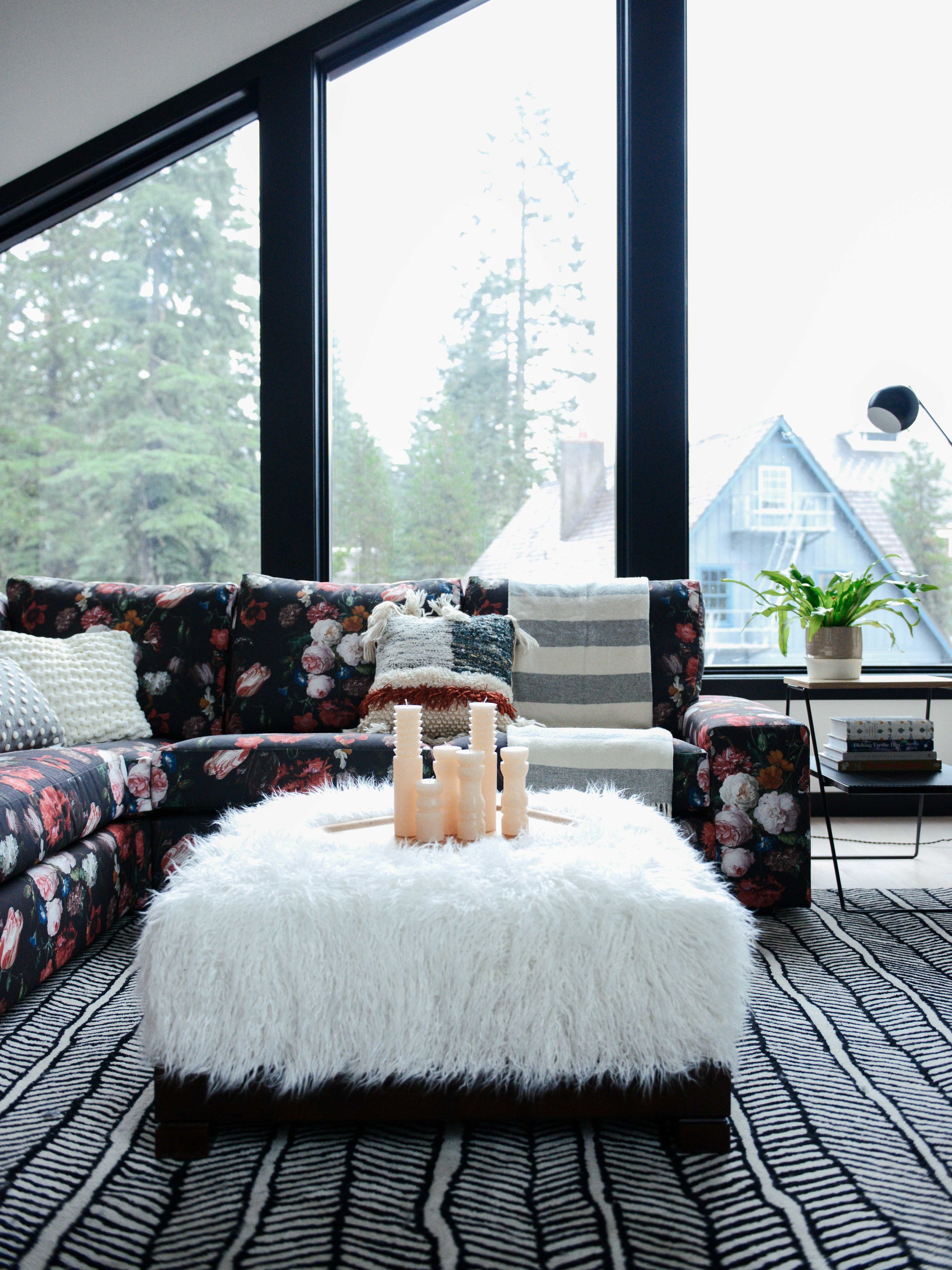 Modern Black & White Mountain Cabin Living Area with Custom Floral Sofa | Casework Interior Design | Portland, OR