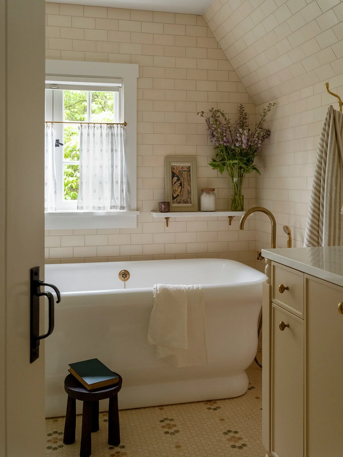 Historic home bathroom renovation with custom vanity and tile