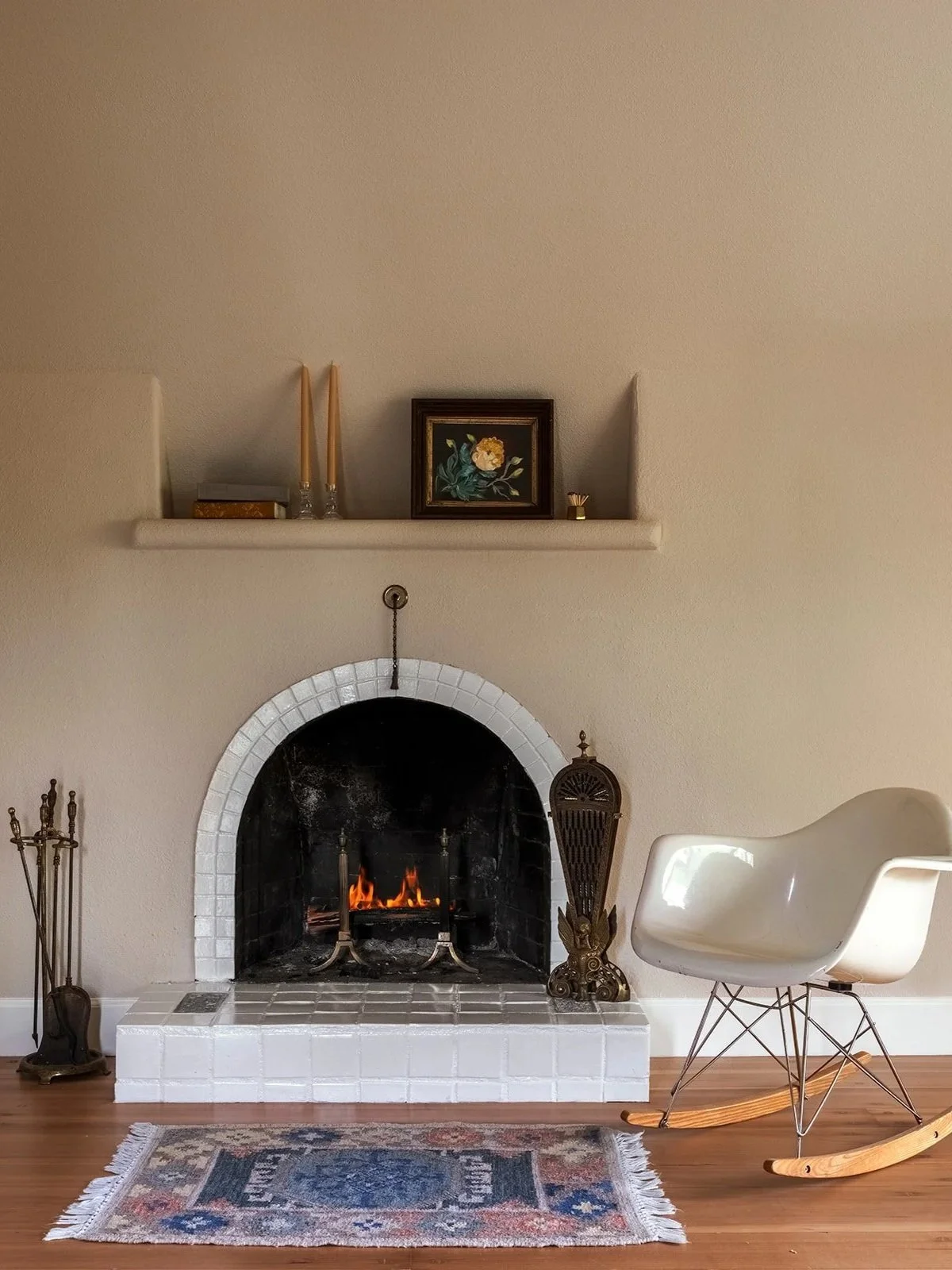 Primary bedroom in historic home with refinished fireplace