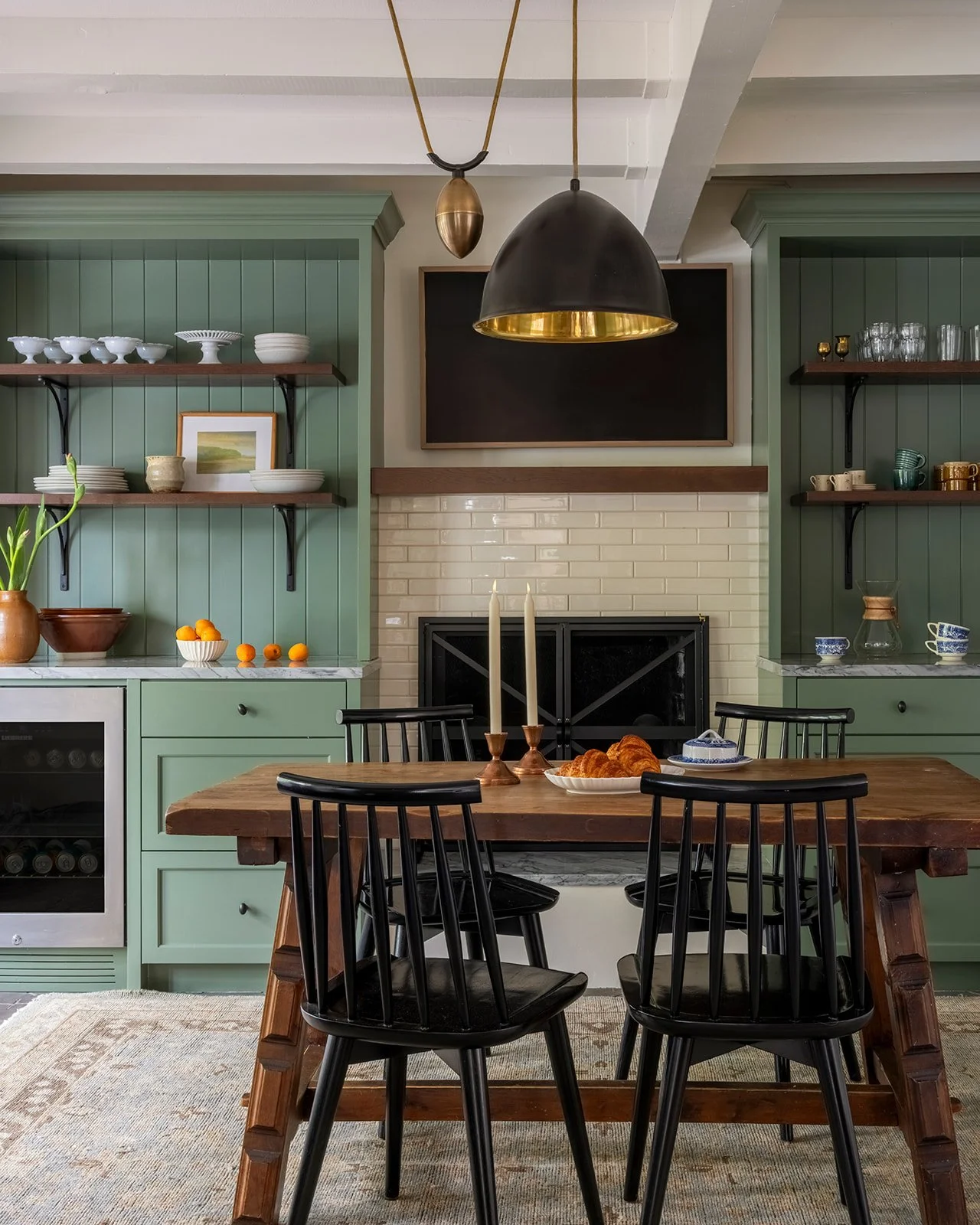 Historic home kitchen featuring custom cabinetry and natural stone surfaces