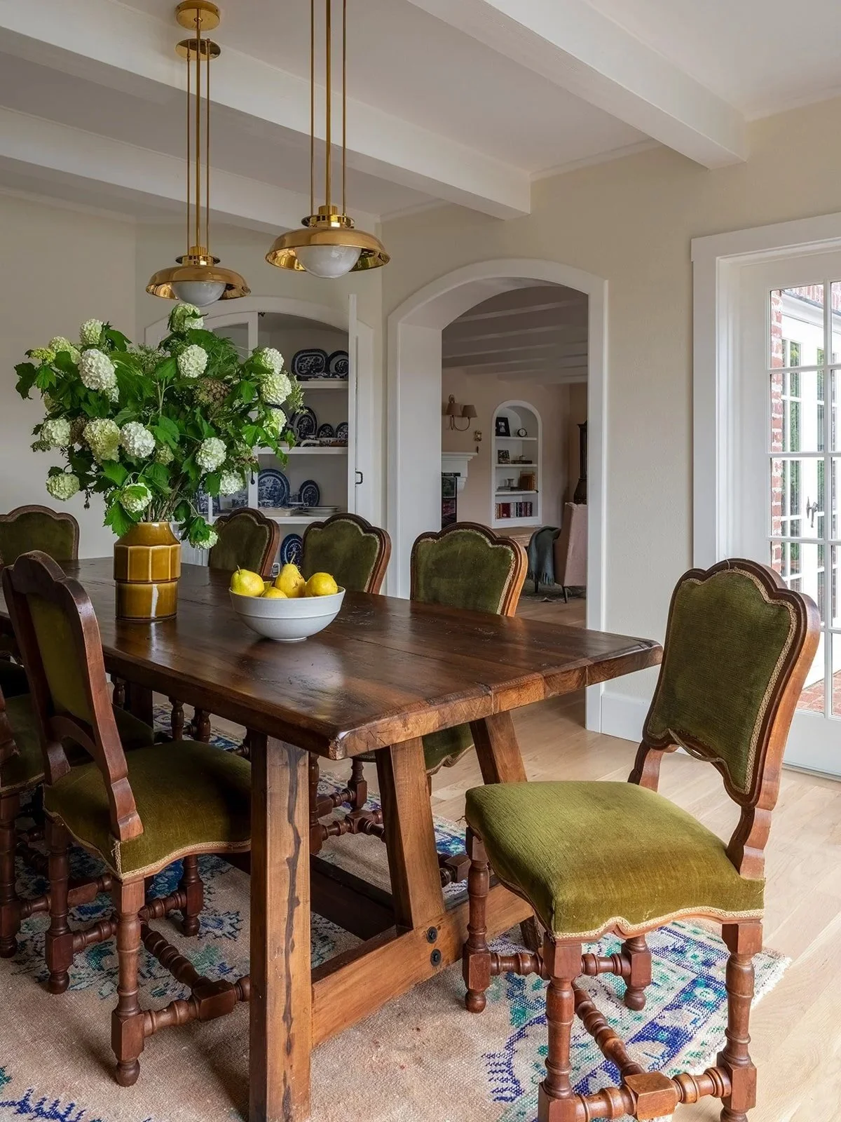Historic dining room with custom lighting and preserved architectural detailing