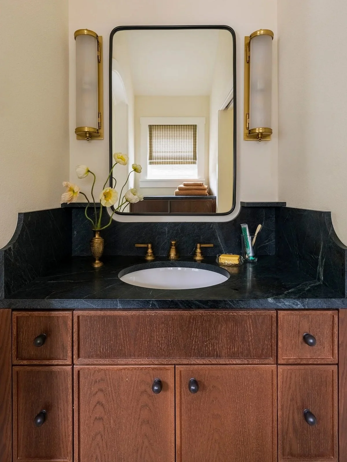 Custom vanity with marble counter in Lake Oswego historic house