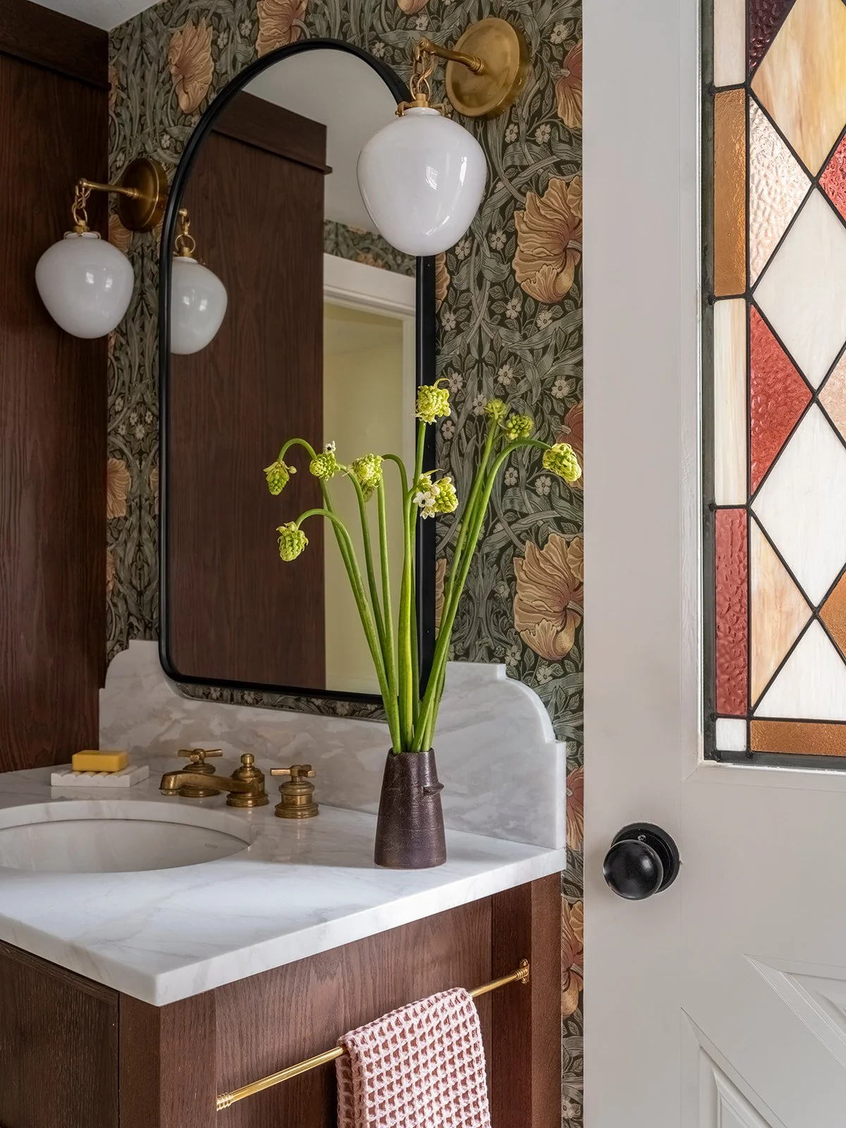 Powder bathroom renovation in historic home with custom wallpaper