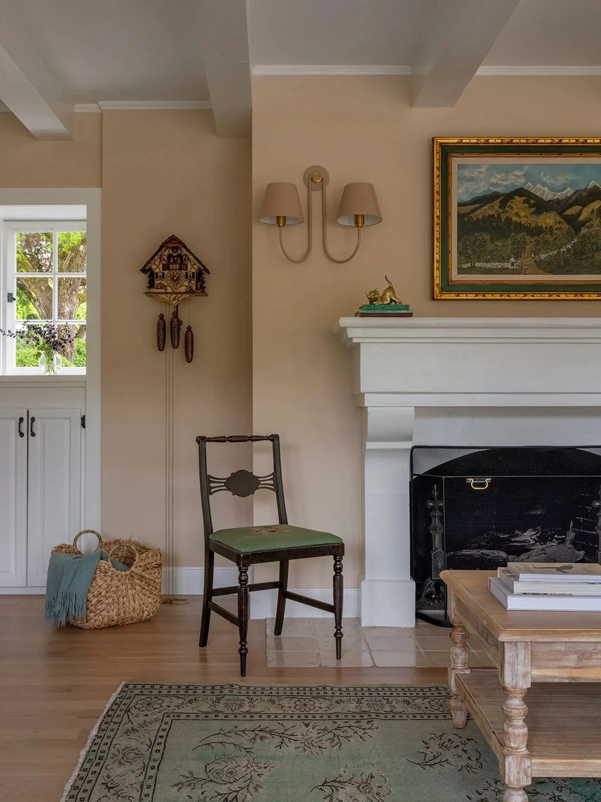 Restored living space featuring original millwork and contemporary furnishings