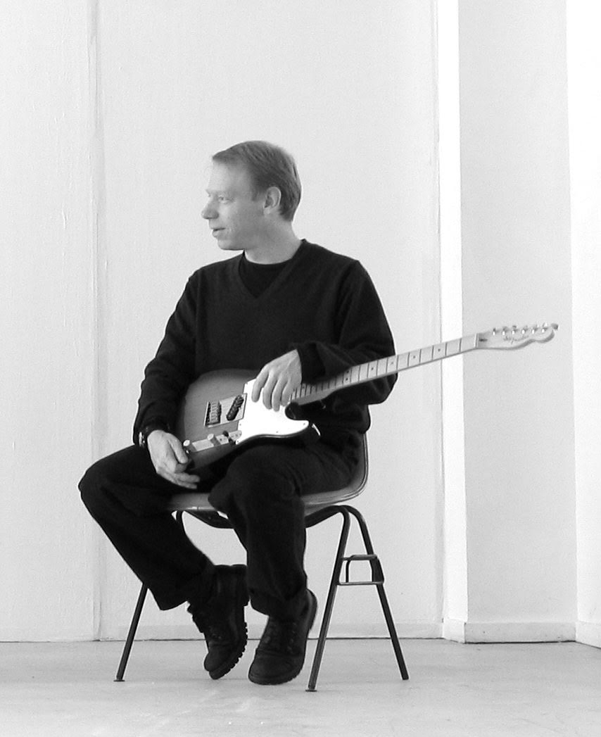 Michael Pisaro is a guitarist, composer and a member of the Wandelweiser collective. His work is not easily defined as his long form compositions result in complex forms which might combine field recordings from urban or rural locations, pure sine waves or fragmented samples of other music with notation for various instruments in solo or orchestral arrangements. Many of his recent works are published on his own imprint Gravity Wave and he teaches composition and experimental music at the California Institute of the Arts.