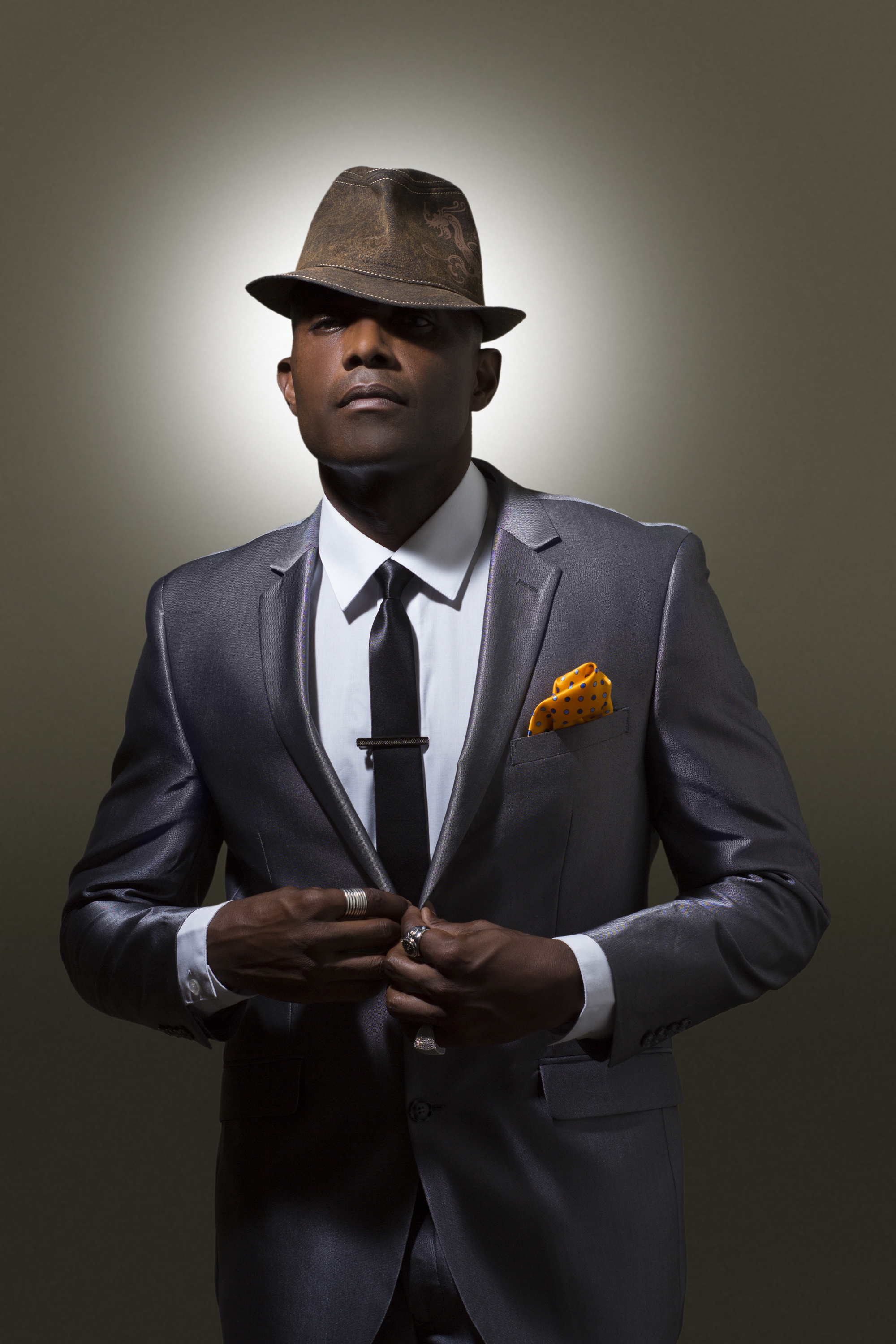 Sophis-Music-Suit-Fedora-Buttoning.jpg