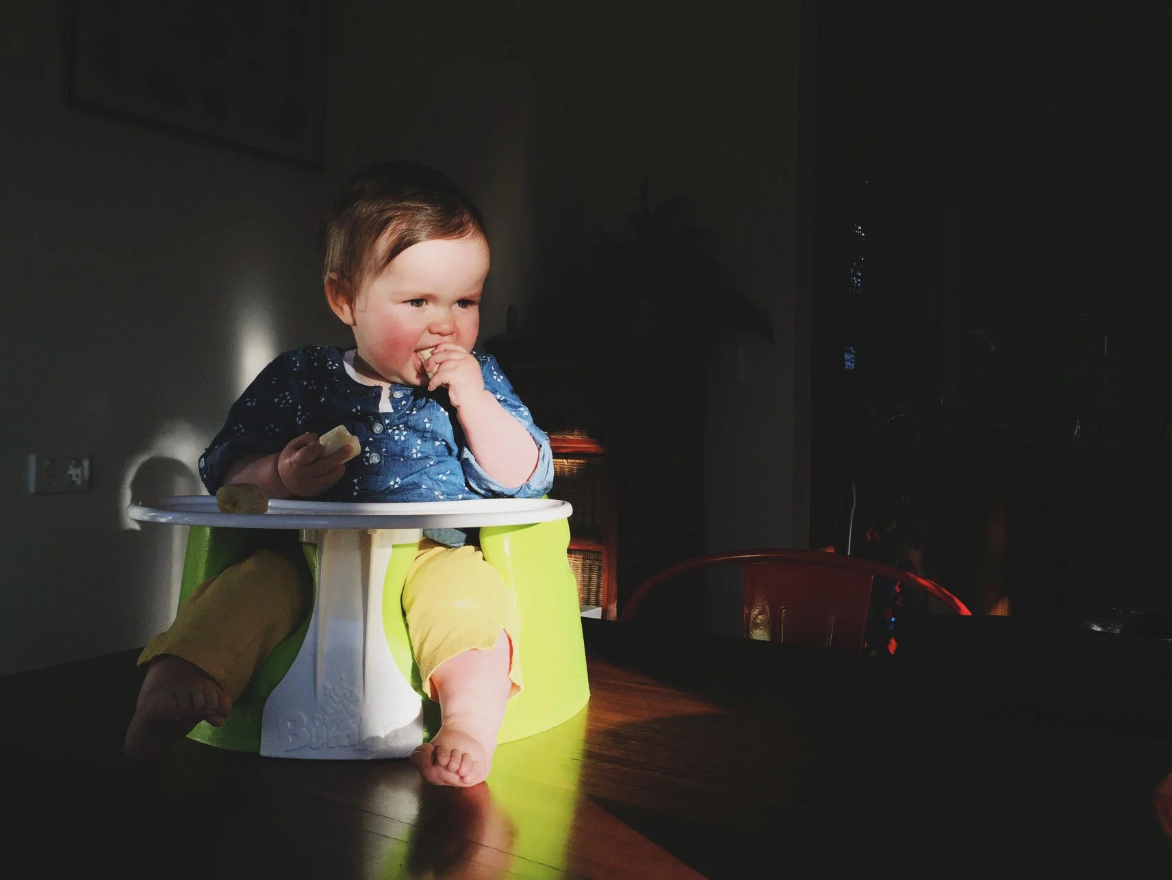 Making use of the narrow beam of light coming in the window created an interesting photo with a dark background.