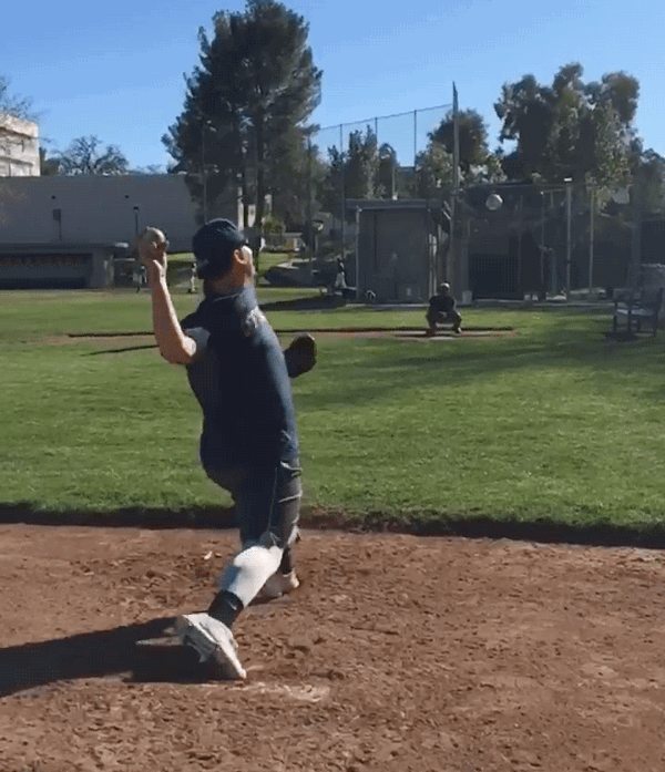 A pitcher during mechanical component Path of Arm Acceleration.