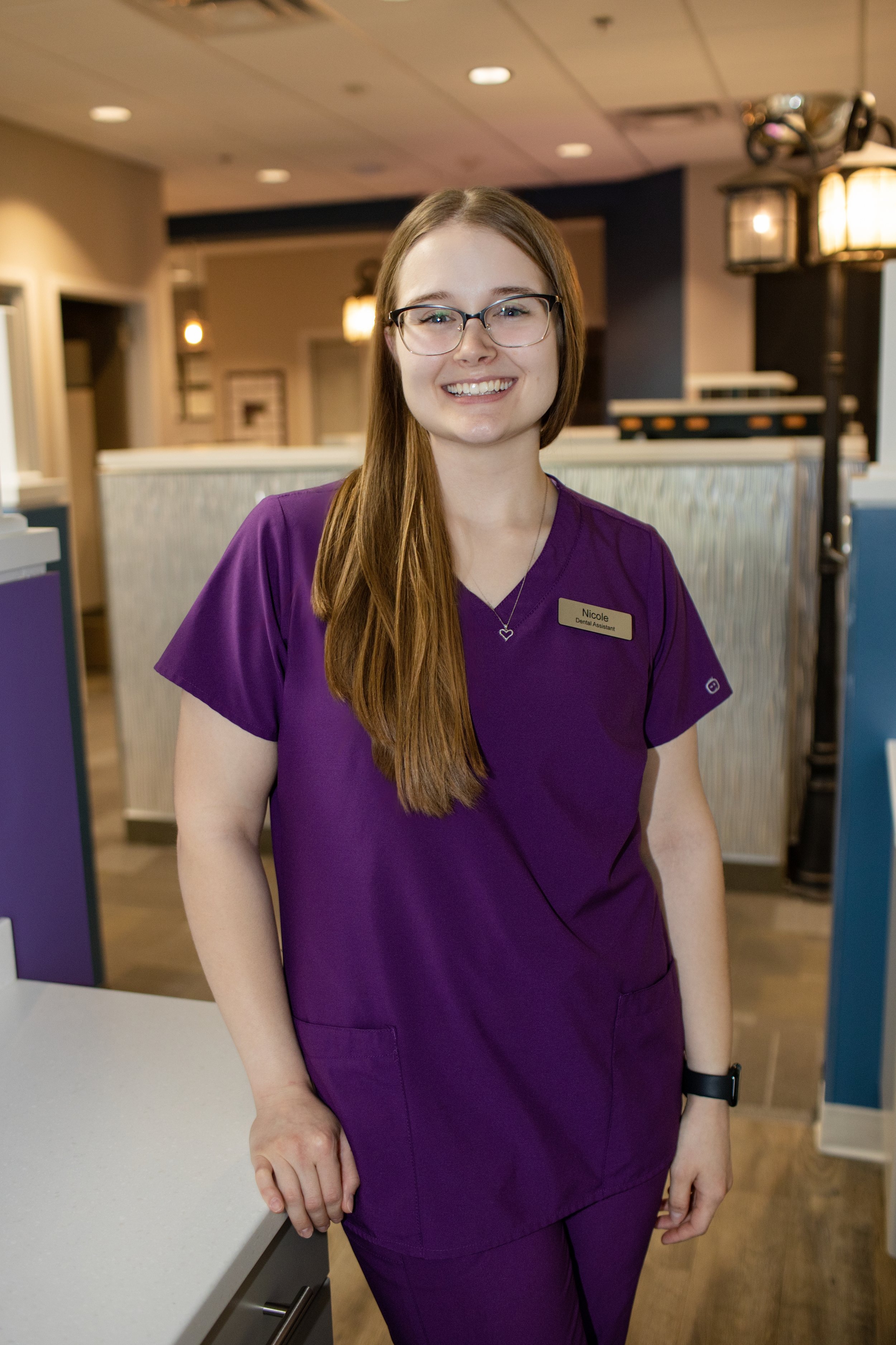 Photo of Nicole wearing glasses