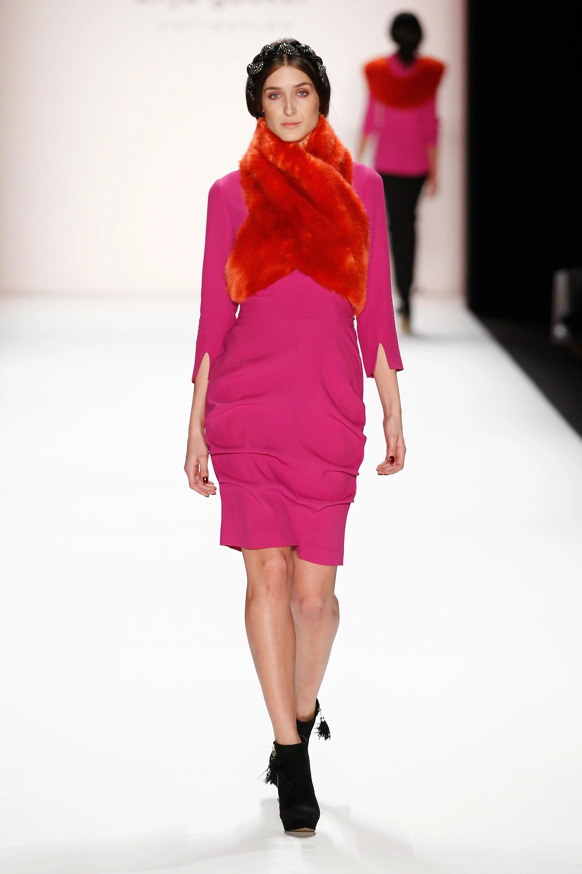 BERLIN, GERMANY - JANUARY 15: A model walks the runway at the Anja Gockel show during Mercedes-Benz Fashion Week Autumn/Winter 2014/15 at Brandenburg Gate on January 15, 2014 in Berlin, Germany. (Photo by Peter Michael Dills/Getty Images for IMG)