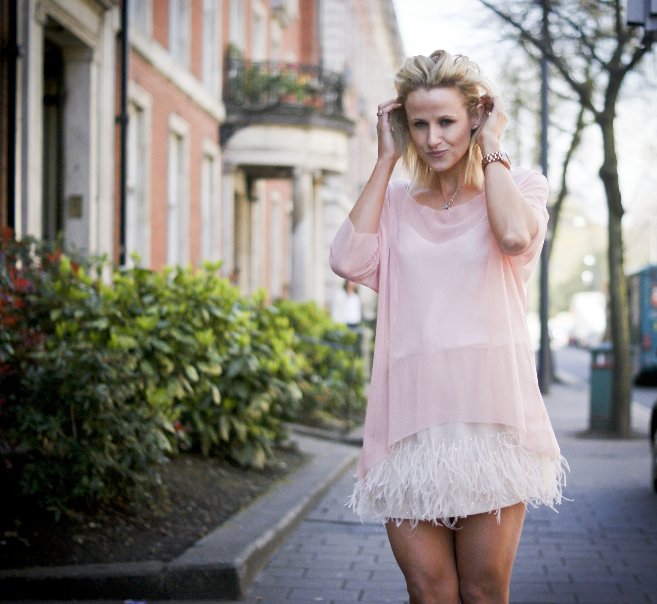 Andrea-Fenise-Feather-SkirtTrends
