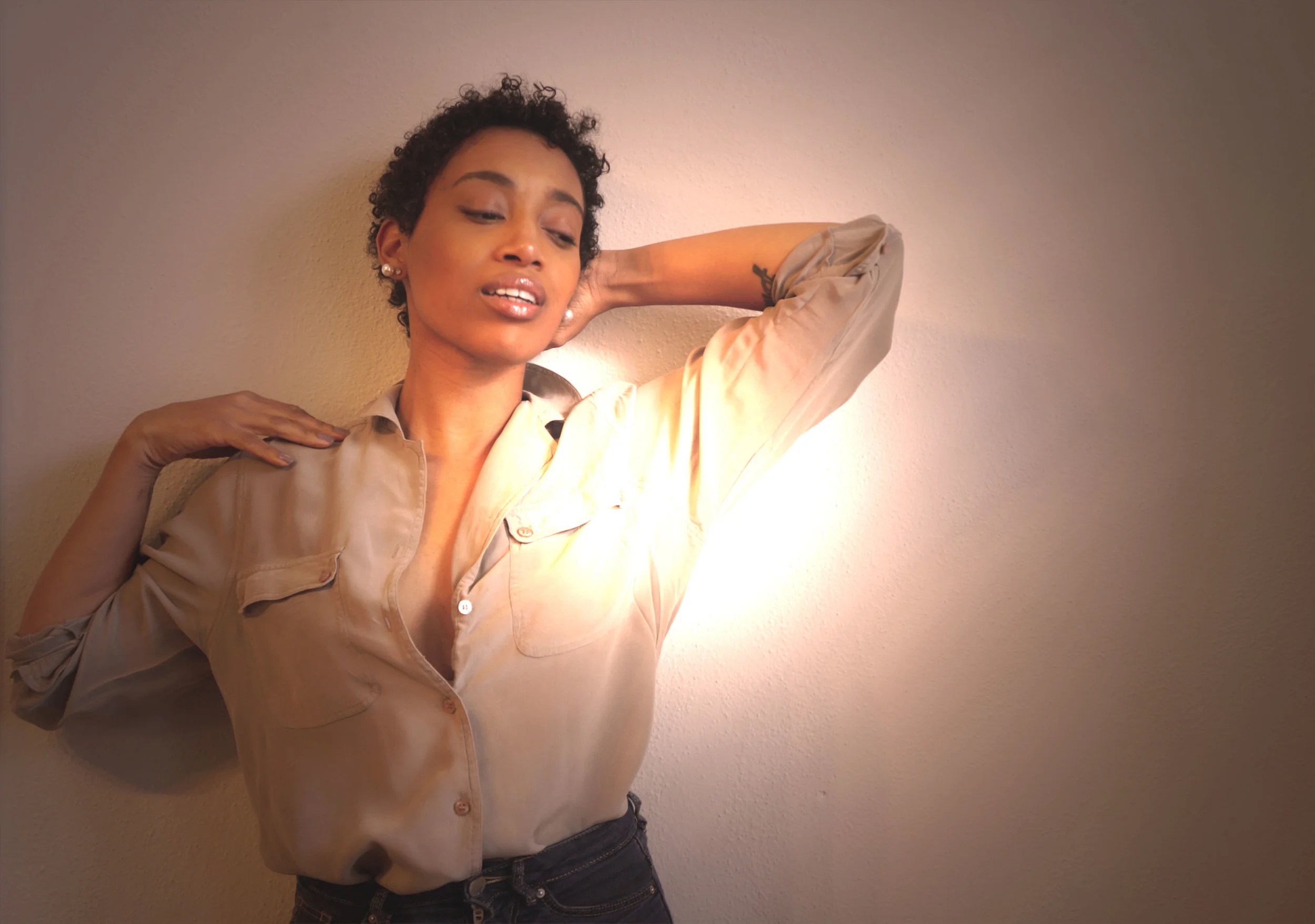 Andrea Fenise Memphis Fashion Blogger styles a silk blouse and jeans