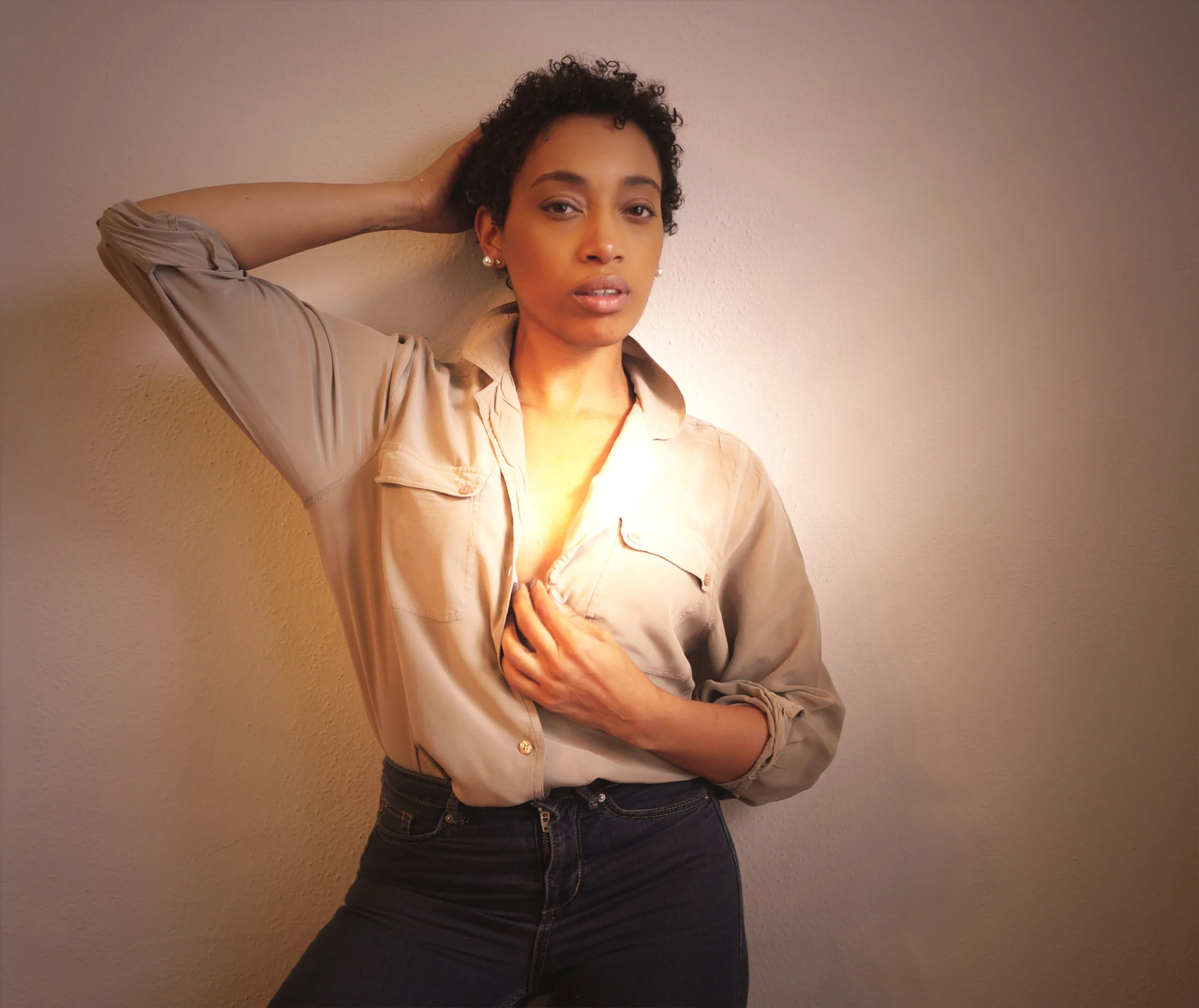 Andrea Fenise Memphis Fashion Blogger styles a silk blouse and jeans 