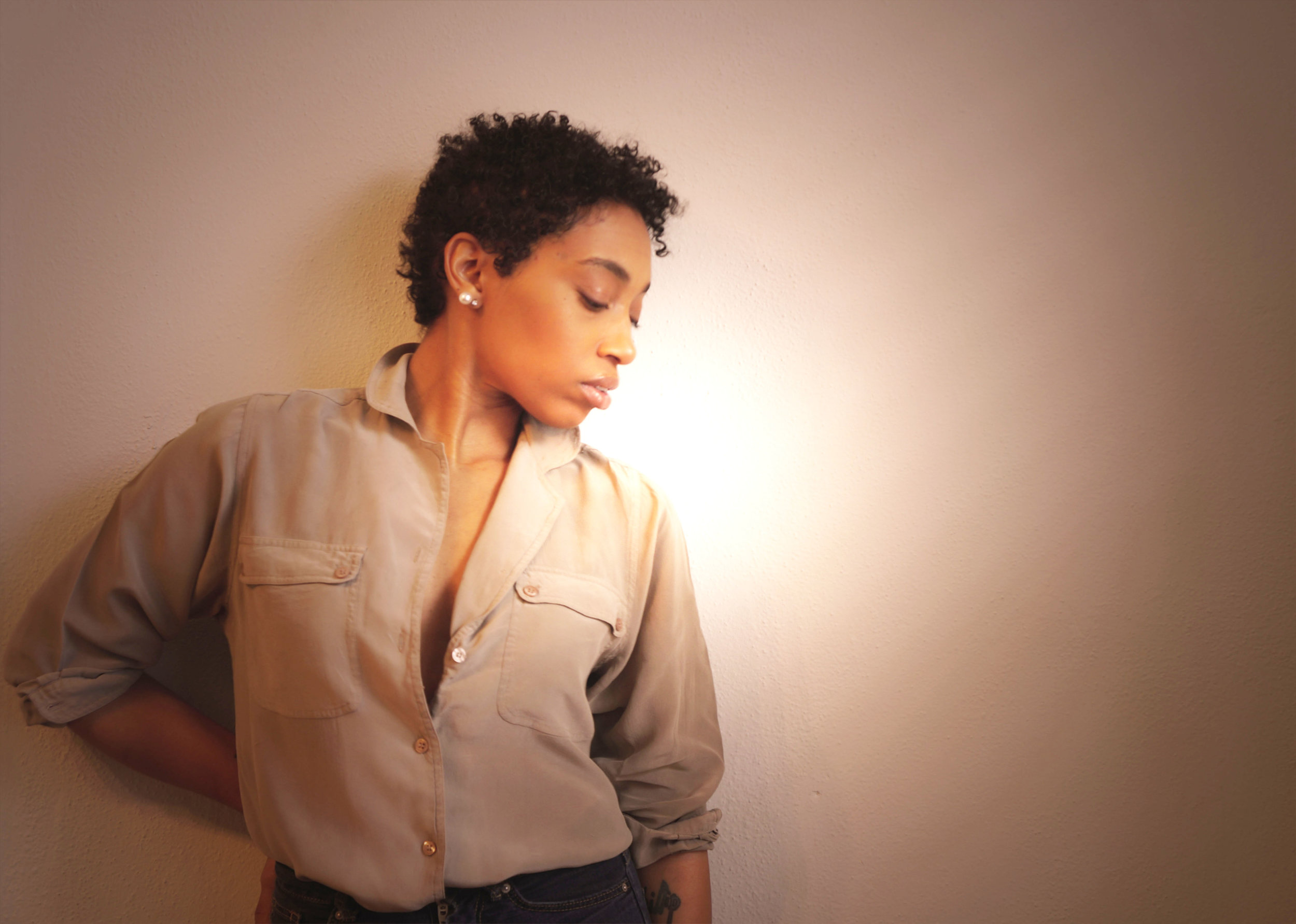 Andrea Fenise styles a silk blouse with jeans 