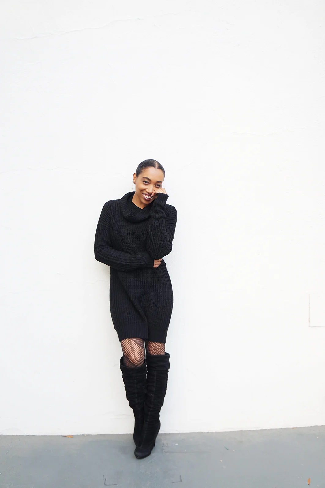 Andrea Fenise Memphis Fashion Blogger styles a cable knit sweater