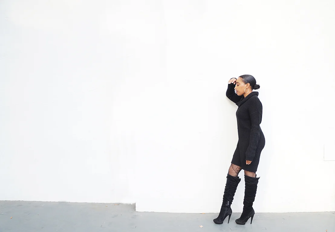 Andrea Fenise Memphis Fashion Blogger styles a cable knit sweater