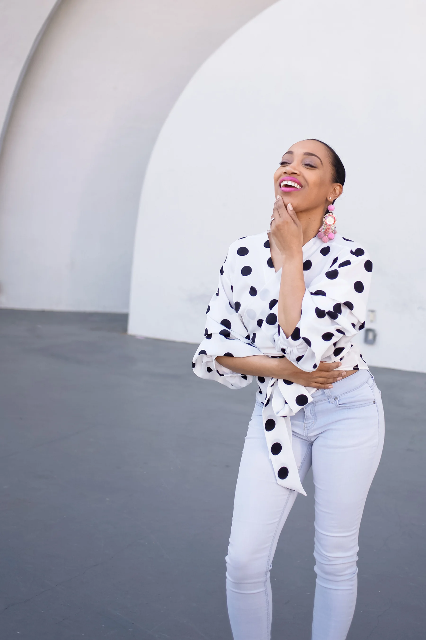 Andrea Fenise Memphis Fashion Blogger shares outfit post with polka dots and pink accessories