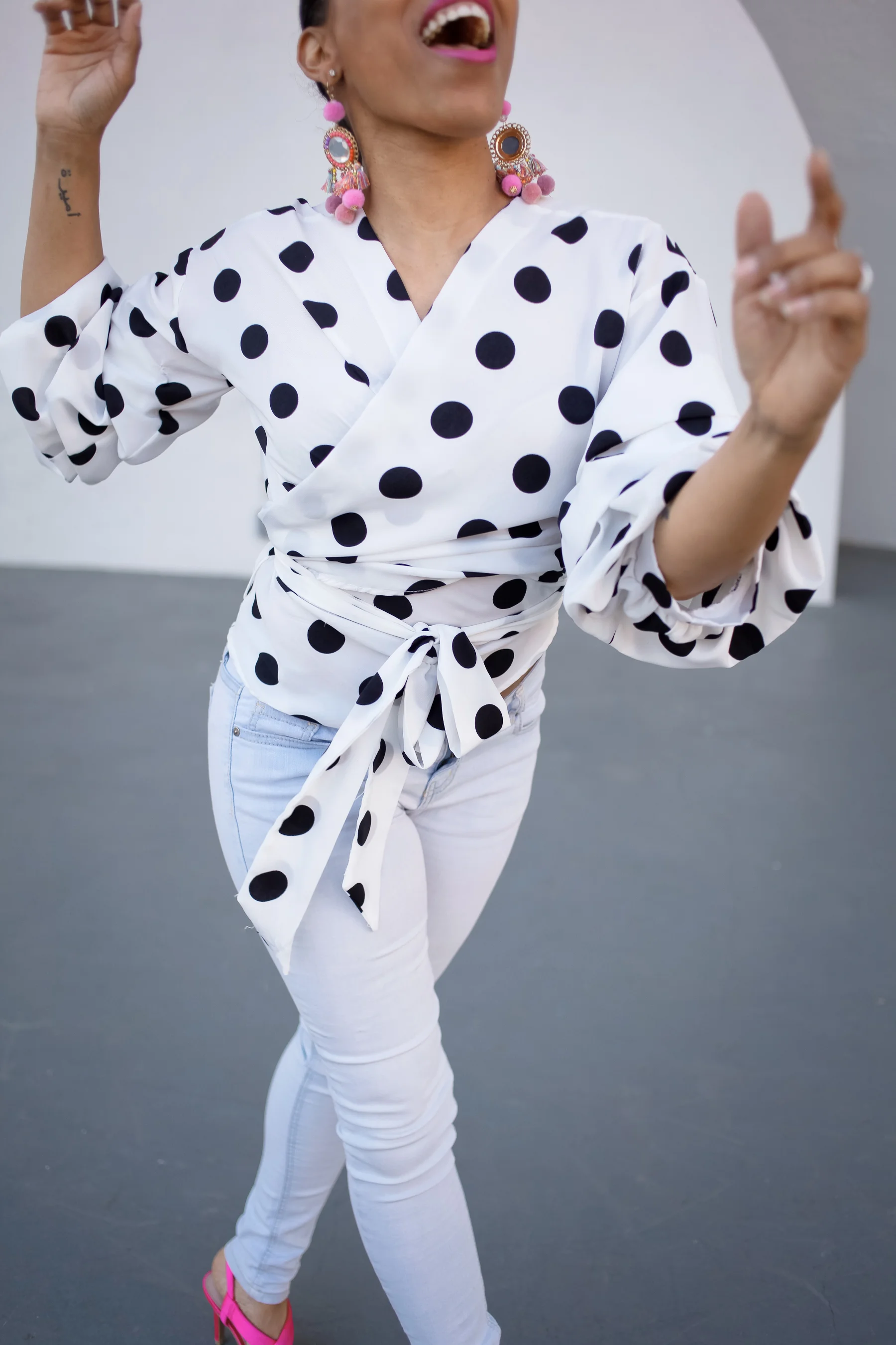 Andrea Fenise Memphis Fashion Blogger shares outfit post with polka dots and pink accessories