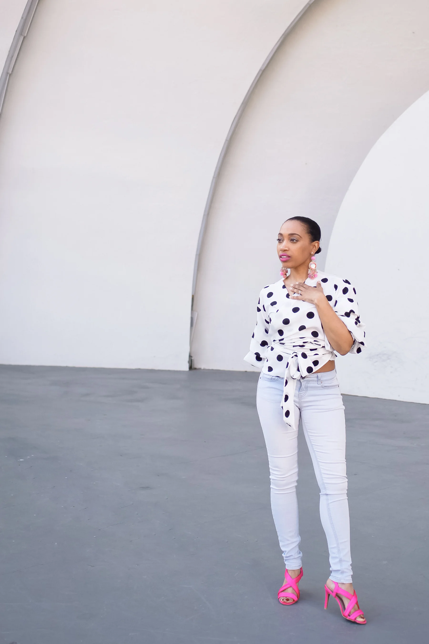 Andrea Fenise Memphis Fashion Blogger shares outfit post with polka dots and pink accessories