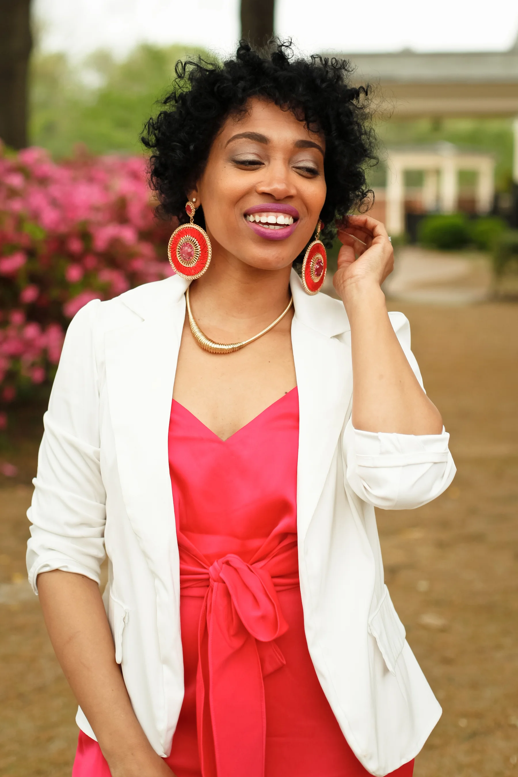 Andrea Fenise Memphis Fashion Blogger styles a white blazer with Rachel Roy Jumpsuit