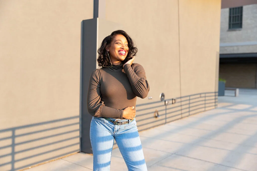Andrea Fenise Memphis Fashion Blogger and Memphis influencer styles a denim wide leg pant for fall