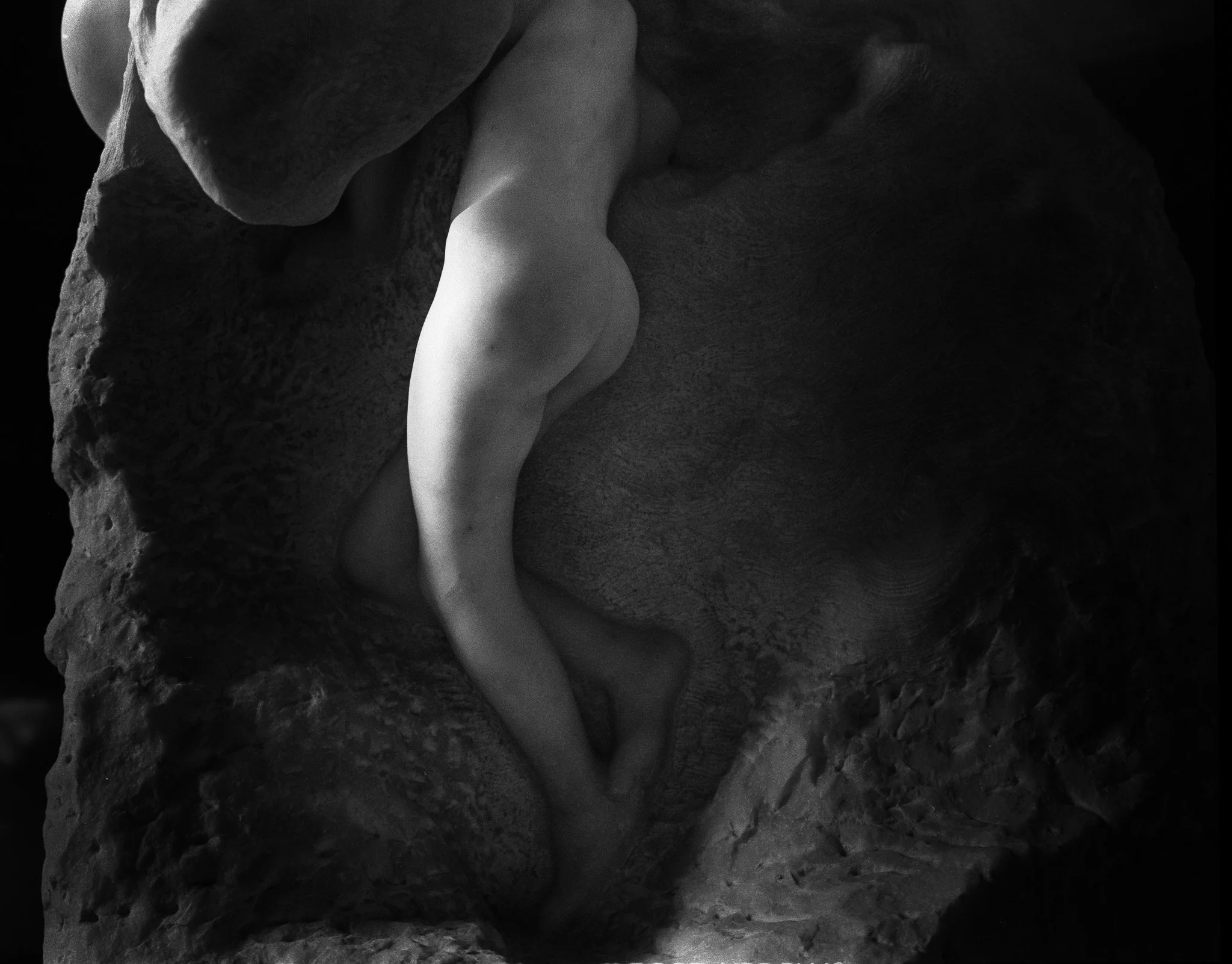 Black-and-white photograph of a sculpture at the Rodin museum, Paris.
