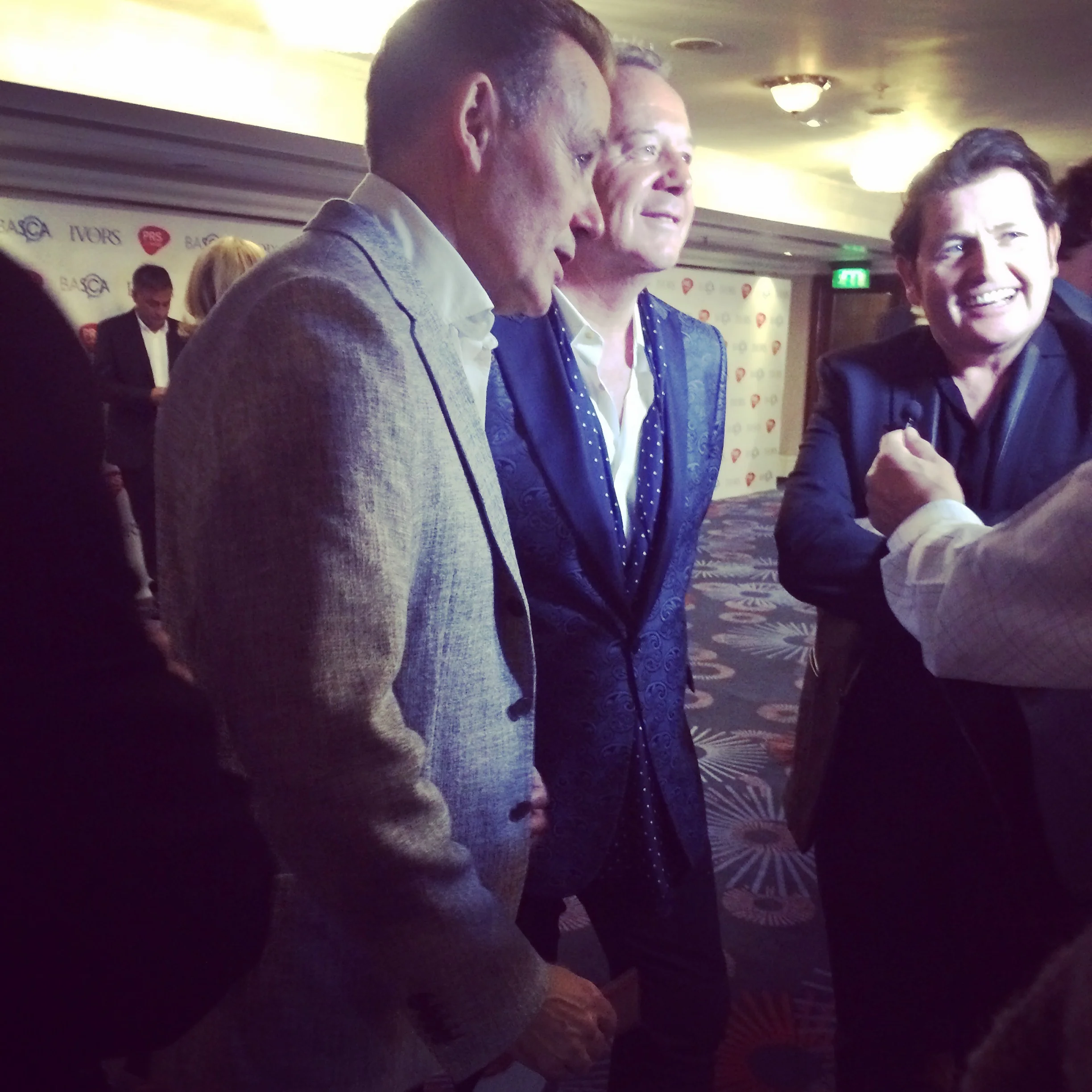 Looking dapper: Jim Kerr and Simple Minds before receiving their Outstanding Song Collection Award at The Ivors 2016 (Image Stylist's own).