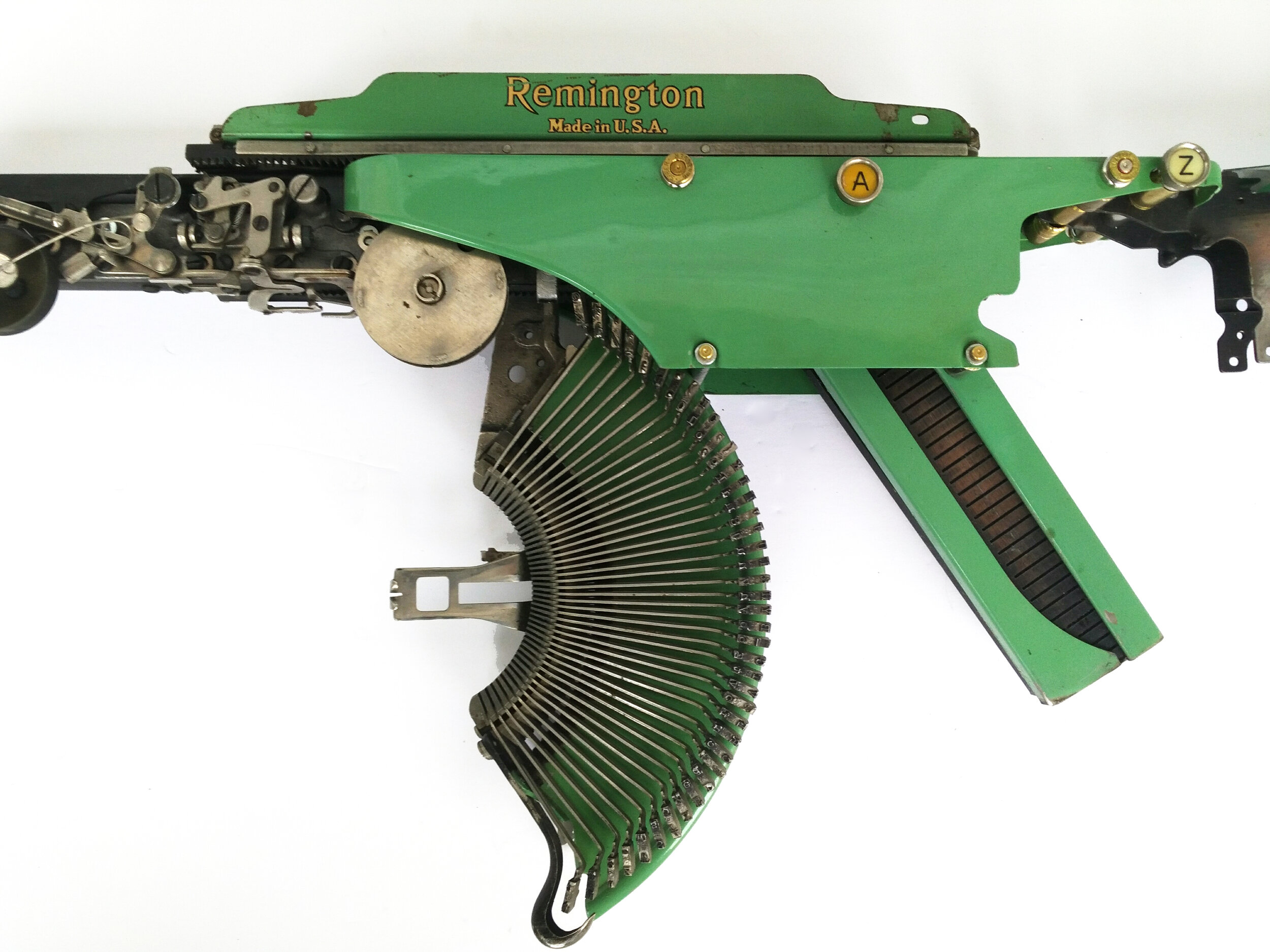 Eric Nado  - Rem Green AZ TAB  (detail) - Typewriter MachineGun series- Size: 11" x 30" x 3” inches. Transformed vintage Remington typewriter gun - SOLD 